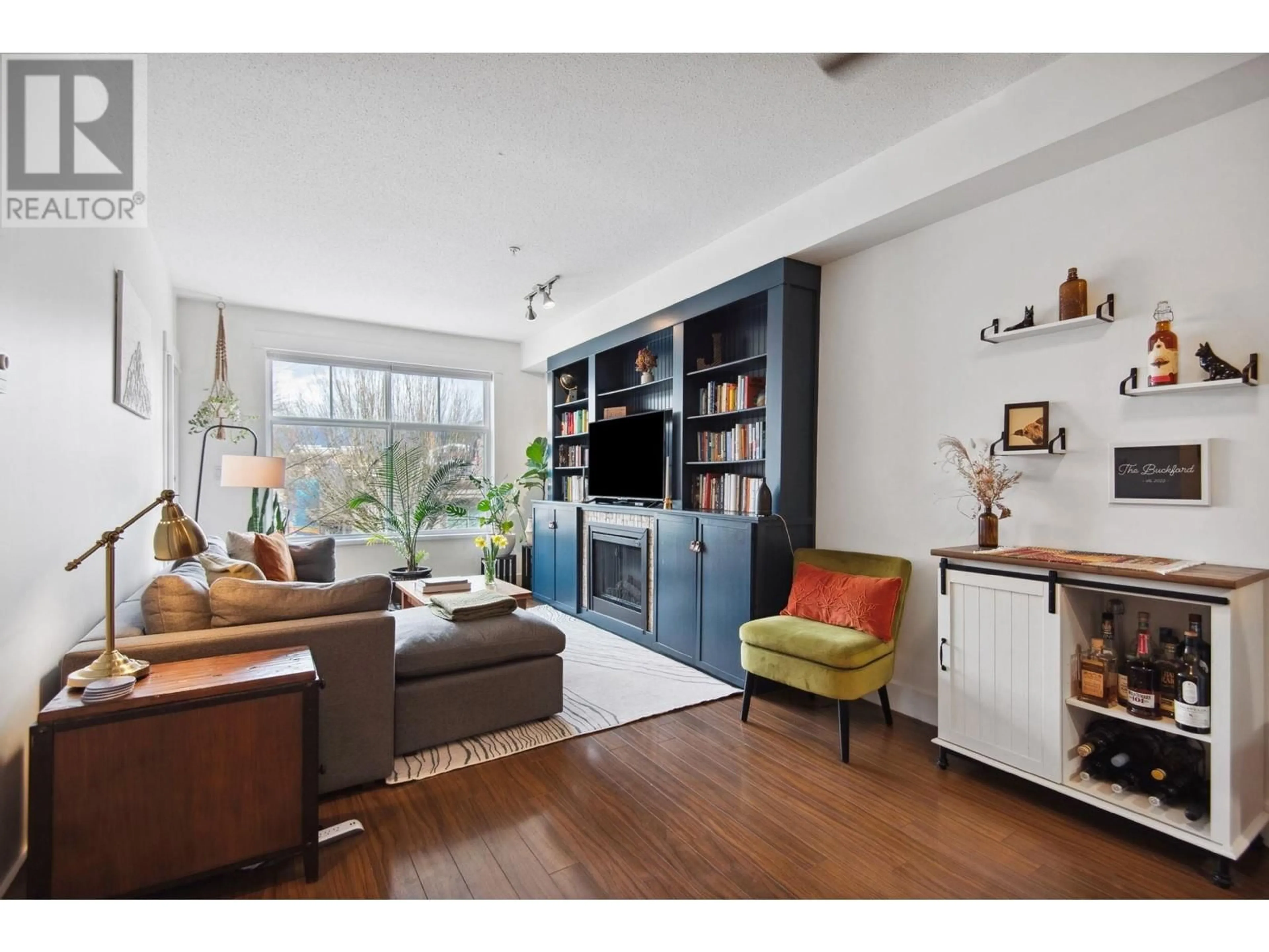 Living room with furniture, wood/laminate floor for 219 1336 MAIN STREET, Squamish British Columbia V8B0R2