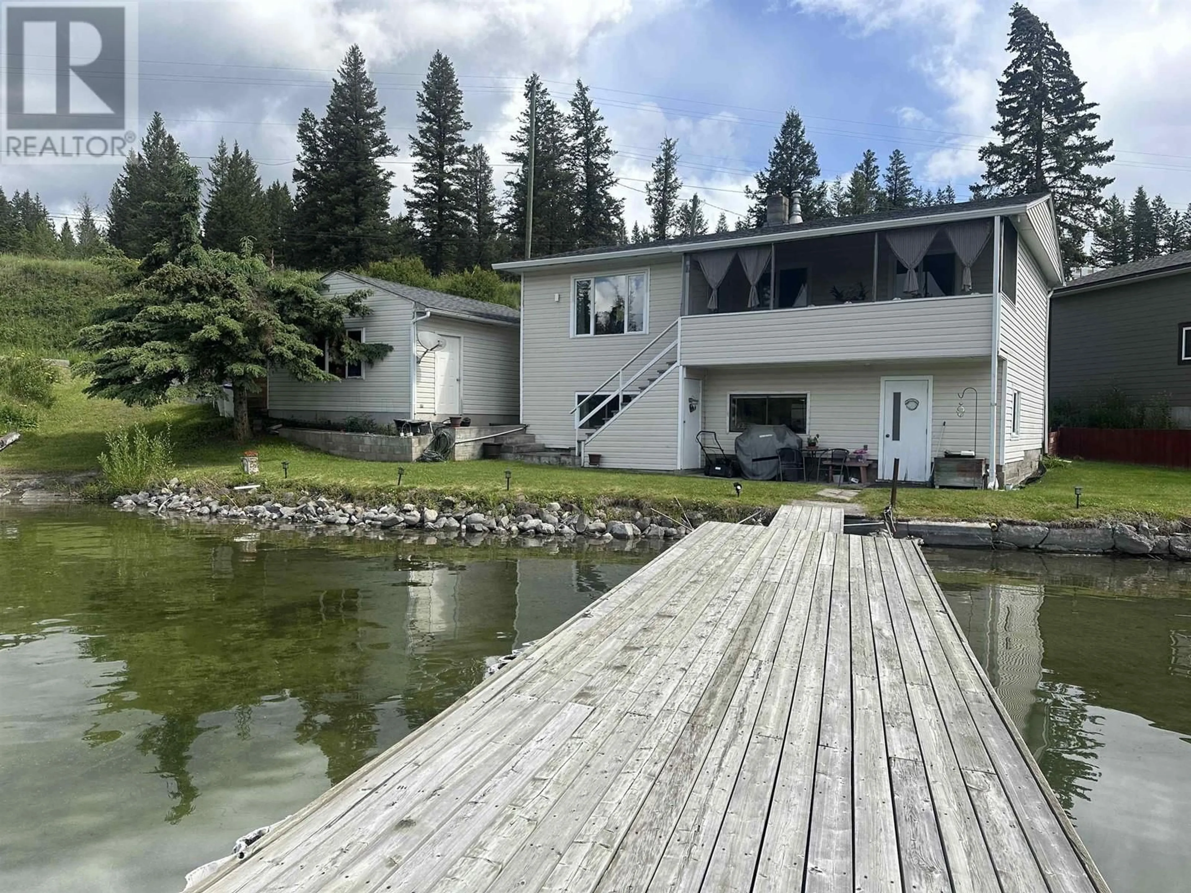 A pic from outside/outdoor area/front of a property/back of a property/a pic from drone, water/lake/river/ocean view for 3594 GUNN ROAD, Lac La Hache British Columbia V0R1T1