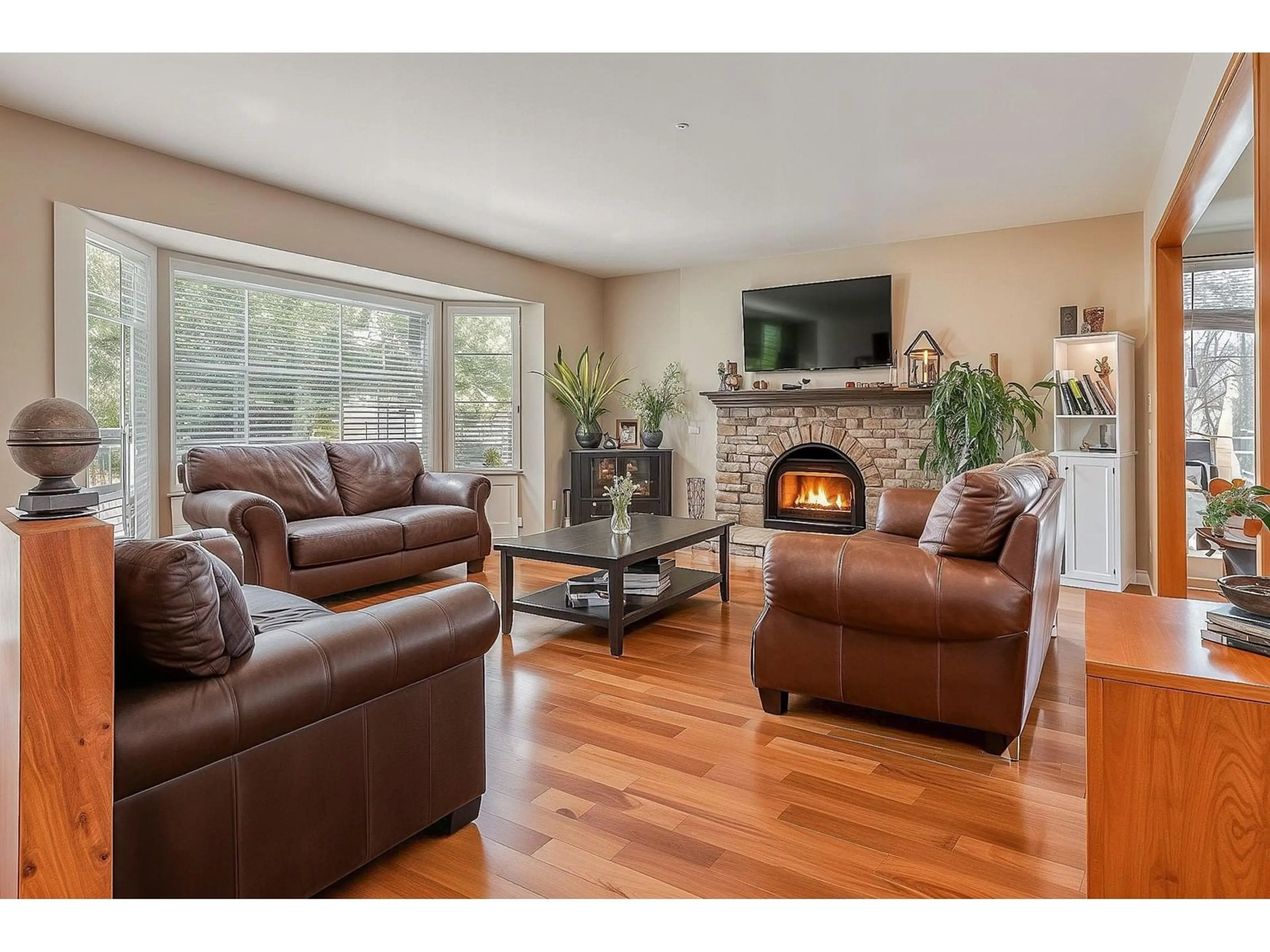 Living room with furniture, wood/laminate floor for 15703 101 AVENUE, Surrey British Columbia V4N2S5