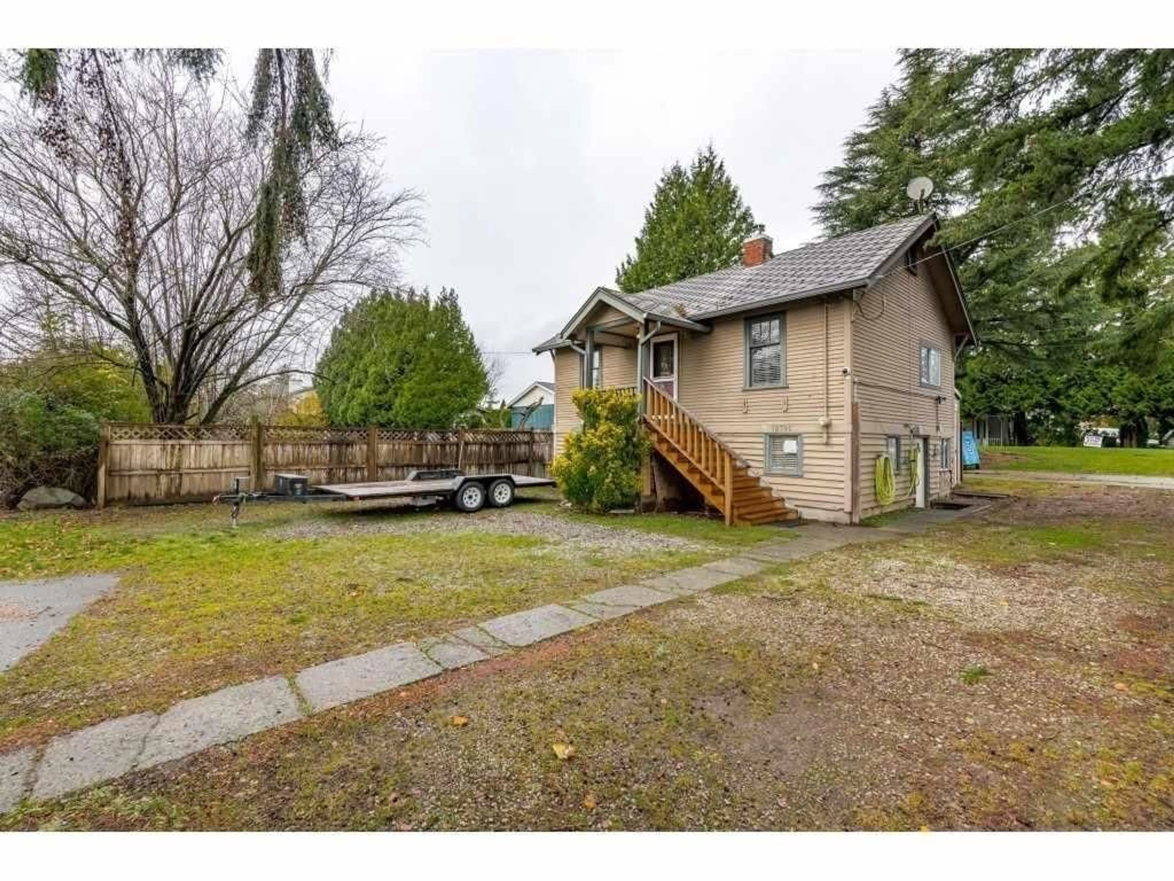 A pic from outside/outdoor area/front of a property/back of a property/a pic from drone, street for 18791 60 AVENUE, Surrey British Columbia V3S8K8