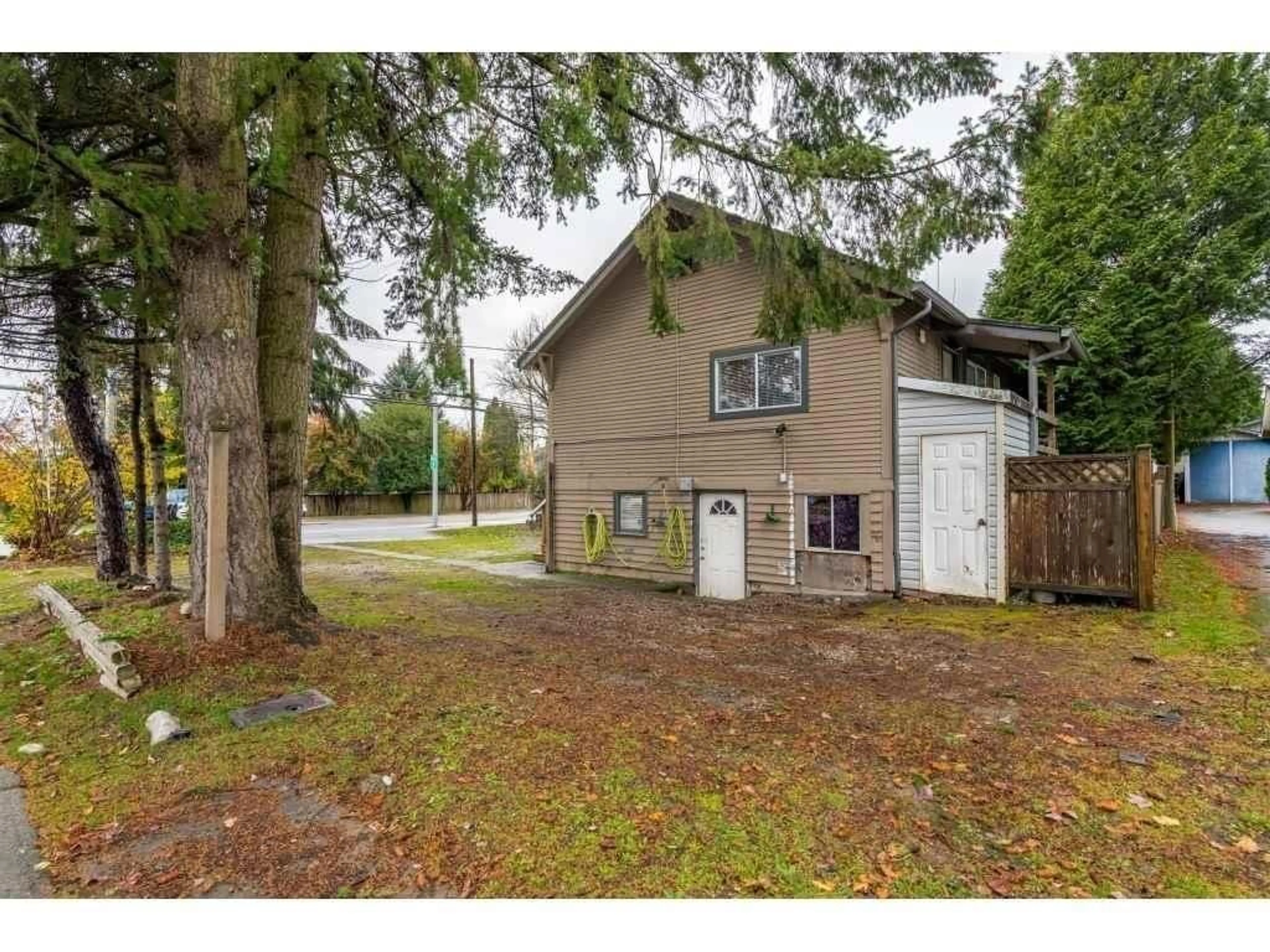 A pic from outside/outdoor area/front of a property/back of a property/a pic from drone, street for 18791 60 AVENUE, Surrey British Columbia V3S8K8