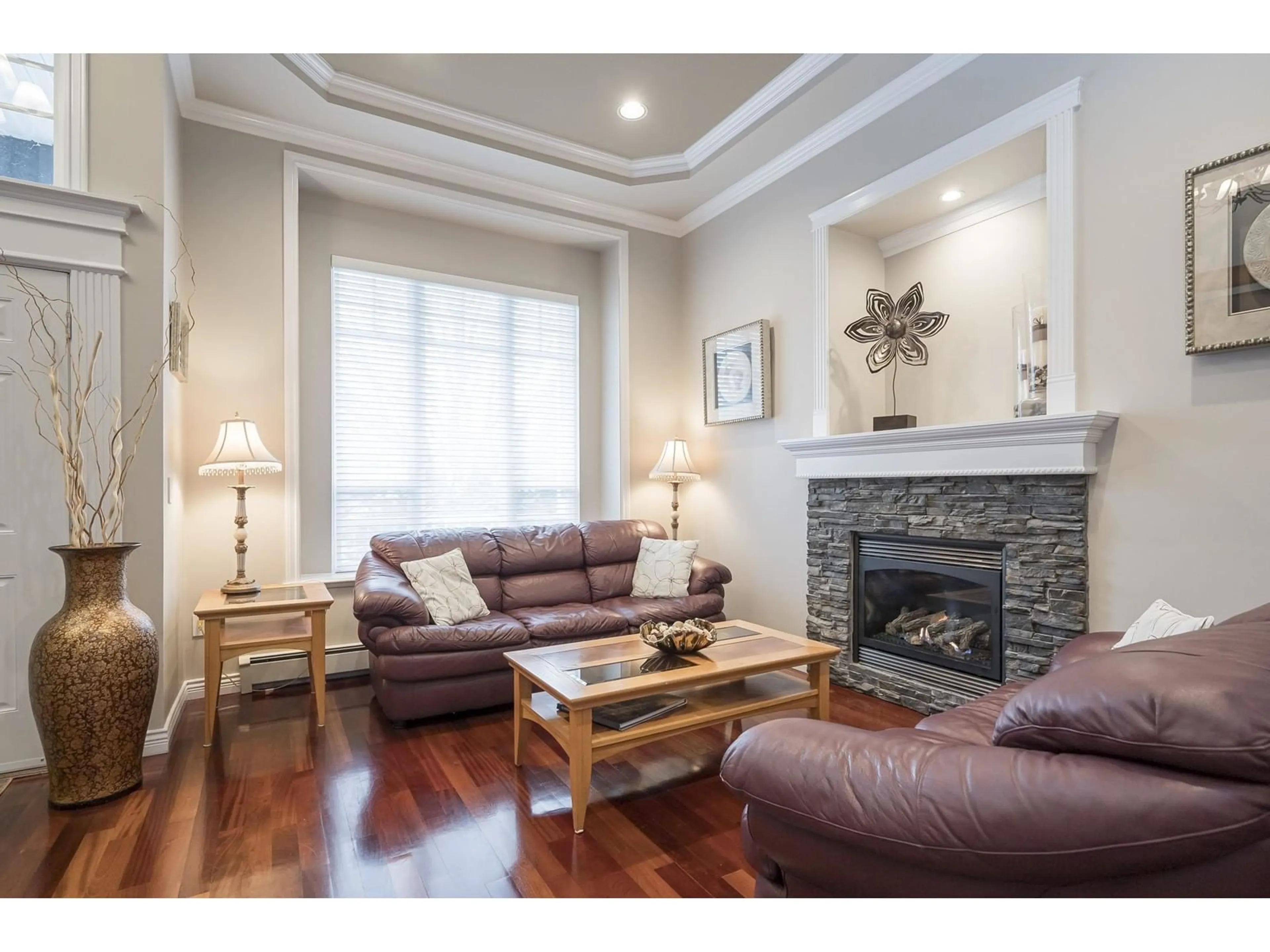 Living room with furniture, wood/laminate floor for 8440 170 STREET, Surrey British Columbia V4N5C7