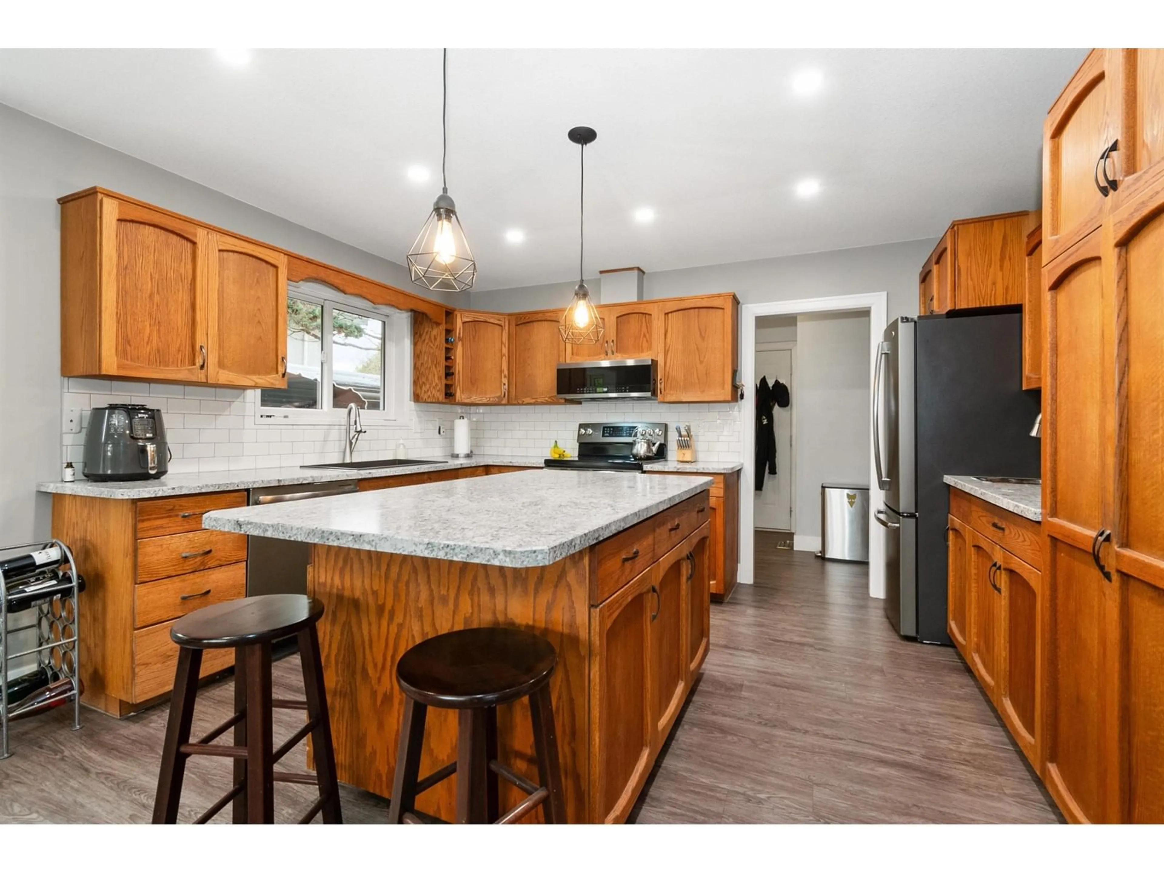 Open concept kitchen, wood/laminate floor for 45298 LAZENBY ROAD|Chilliwack Proper Wes, Chilliwack British Columbia V2P1G3