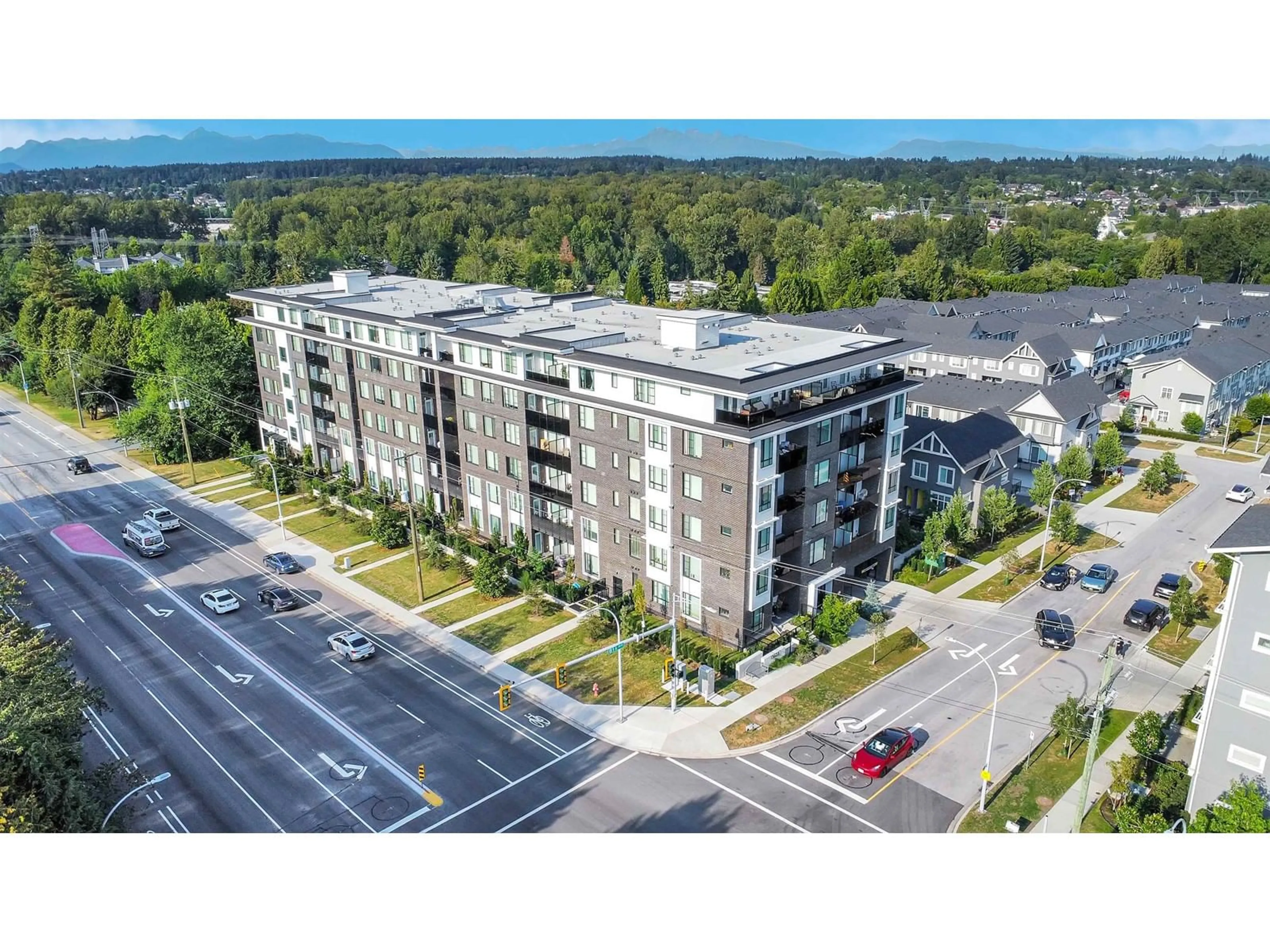 A pic from outside/outdoor area/front of a property/back of a property/a pic from drone, building for 220 - 13623 81A, Surrey British Columbia V3W3N7