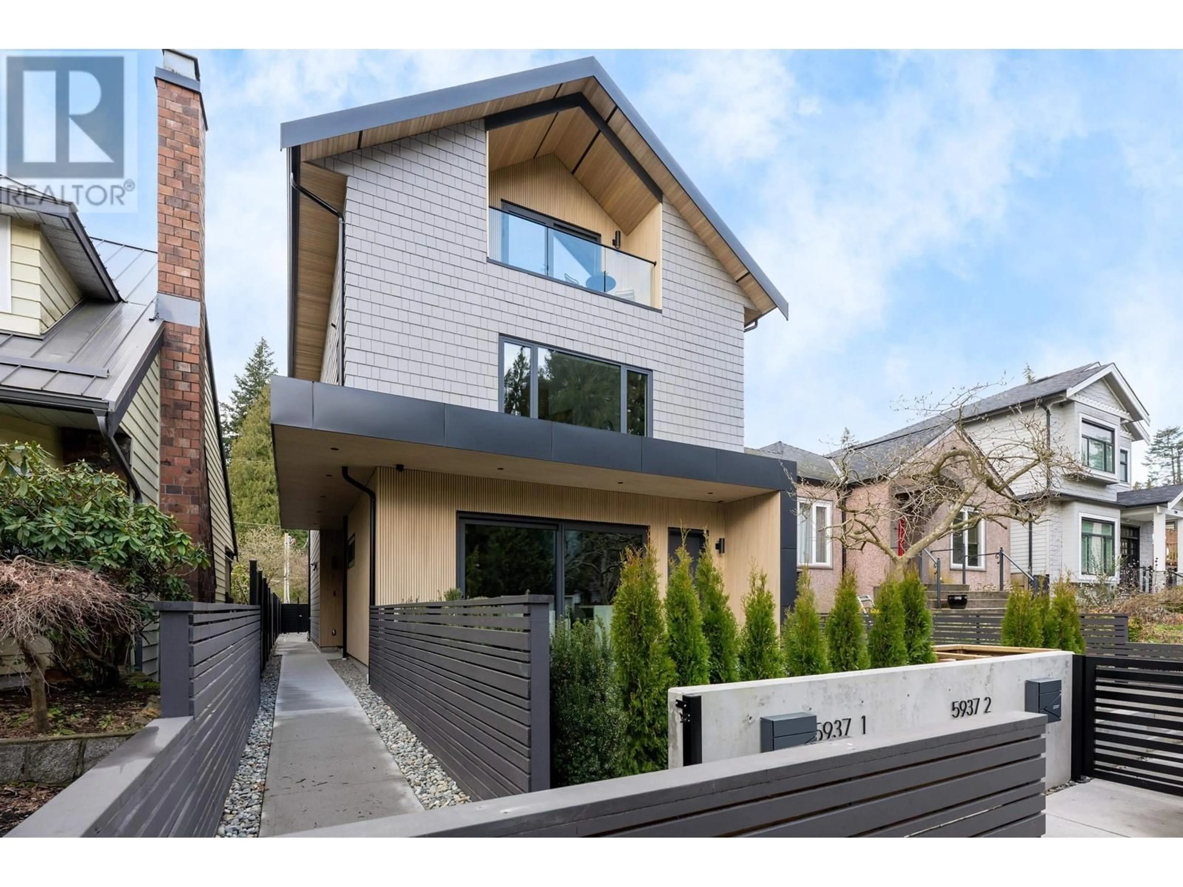 Home with brick exterior material, street for 1 - 5937 HOLLAND STREET, Vancouver British Columbia V6N2B2