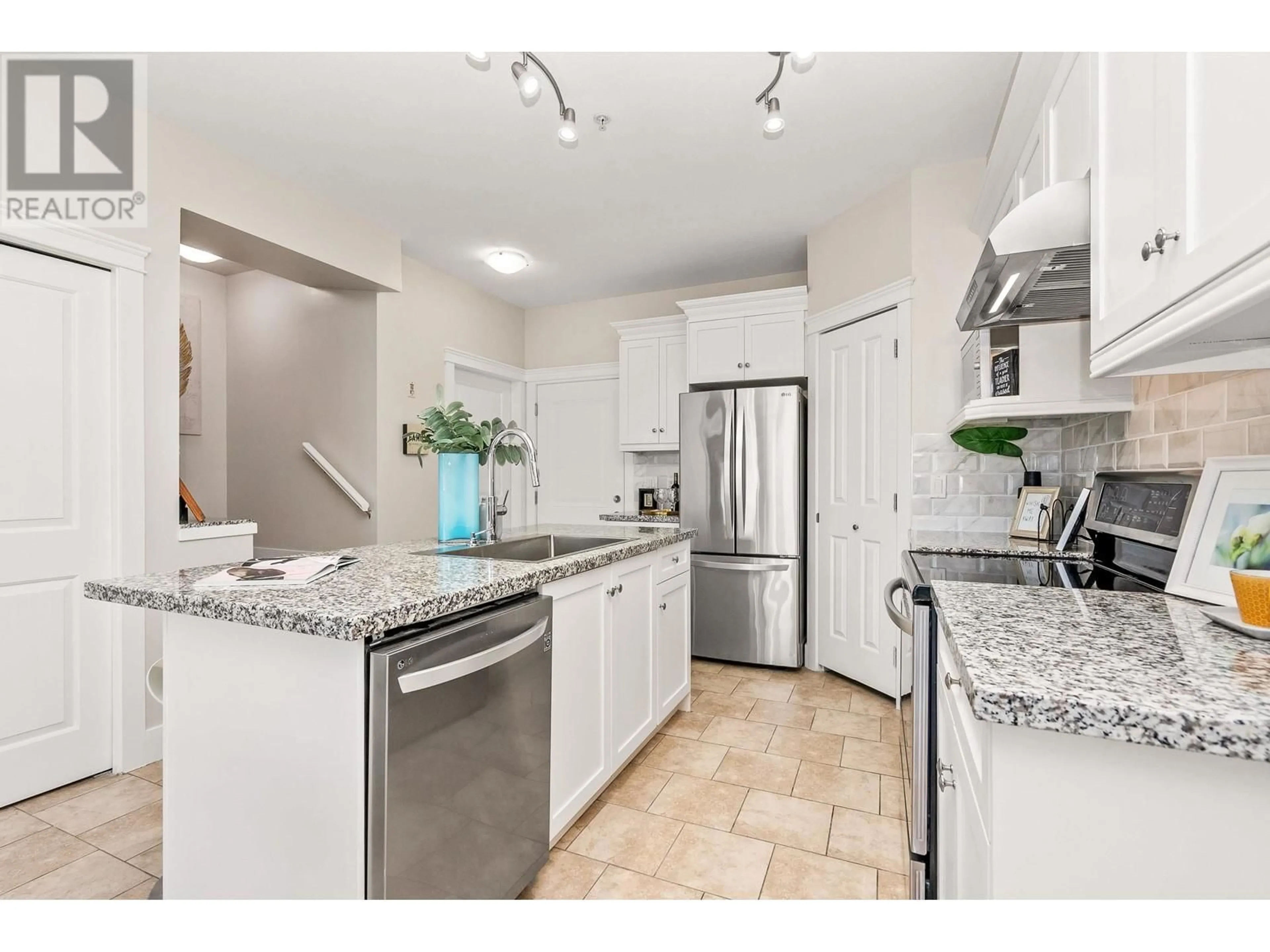 Open concept kitchen, ceramic/tile floor for 211 7908 GRAHAM AVENUE, Burnaby British Columbia V3N1V9