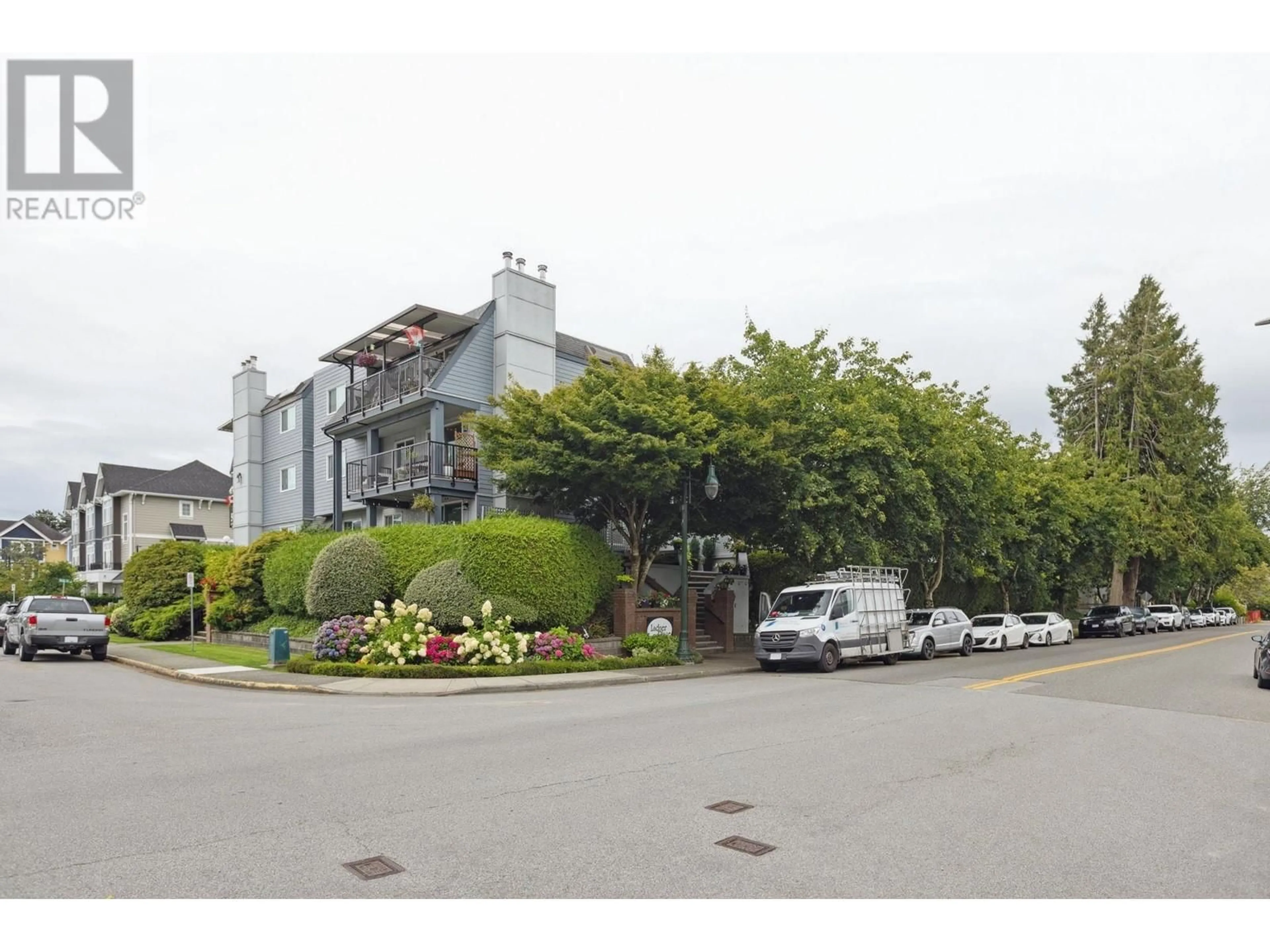 A pic from outside/outdoor area/front of a property/back of a property/a pic from drone, street for 110 - 4926 48 AVENUE, Ladner British Columbia V4K1V3