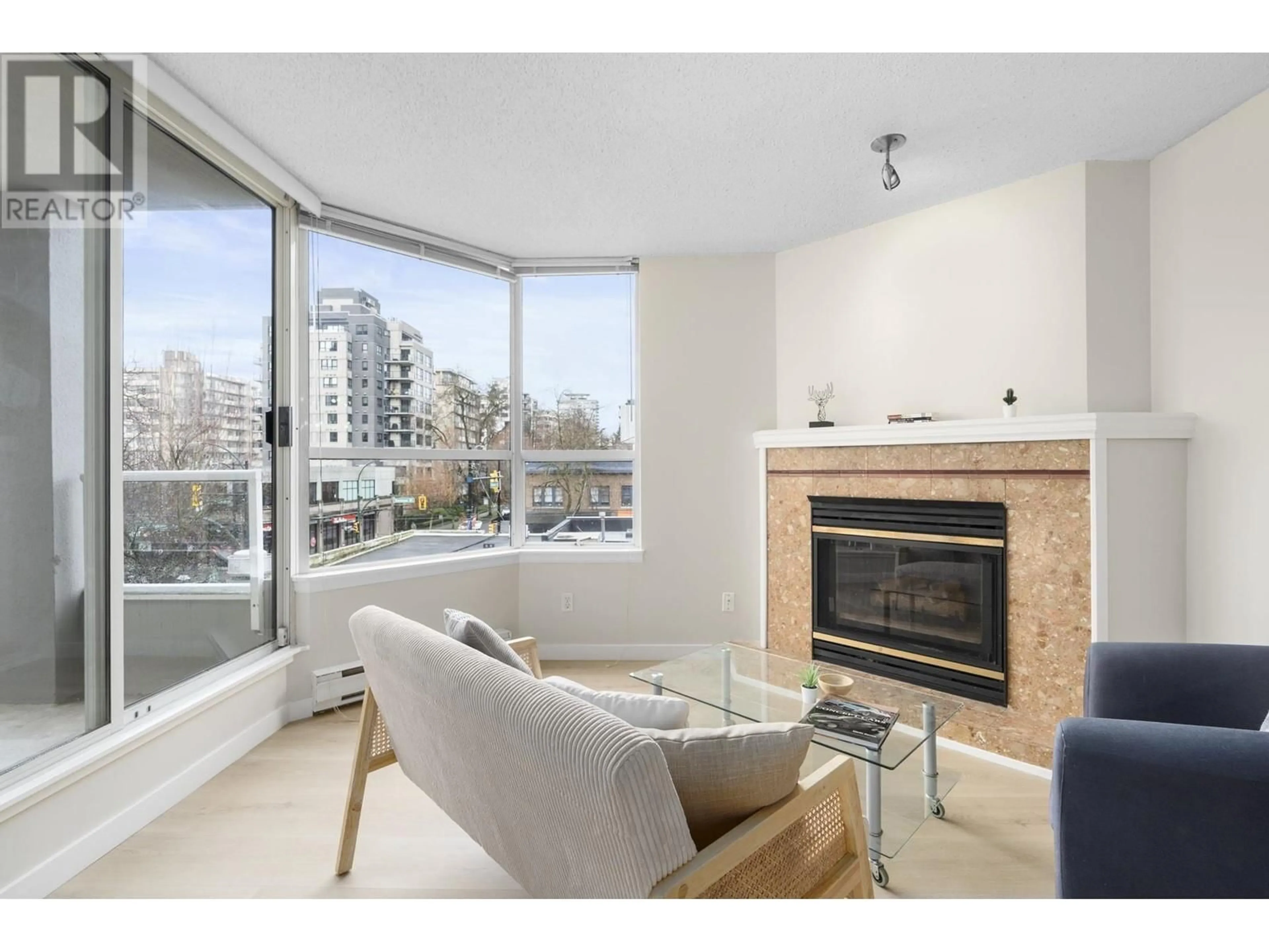 Living room with furniture, wood/laminate floor for 301 1771 NELSON STREET, Vancouver British Columbia V6G1M6