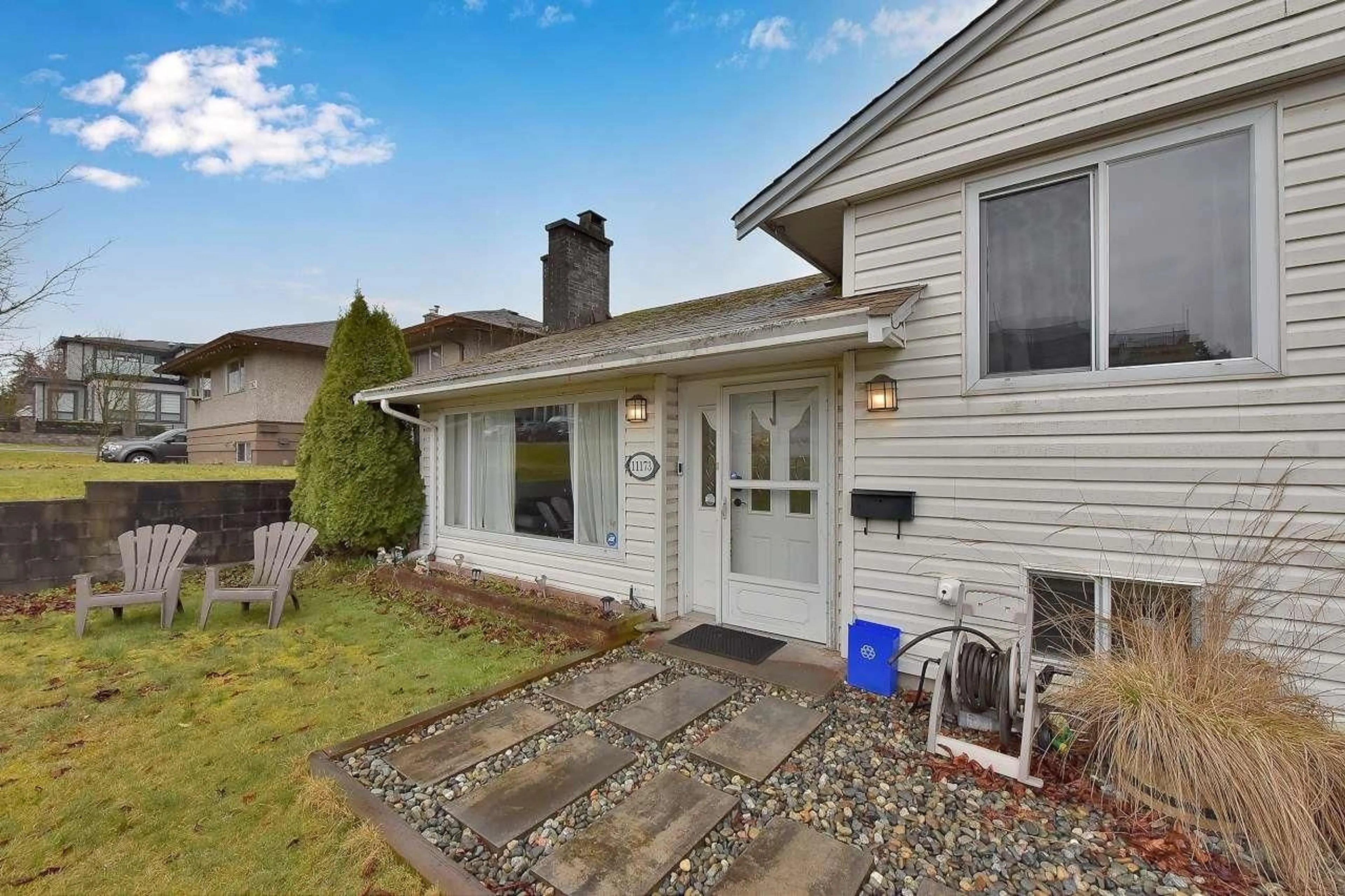 Home with vinyl exterior material, street for 11173 135A, Surrey British Columbia V3R3A7