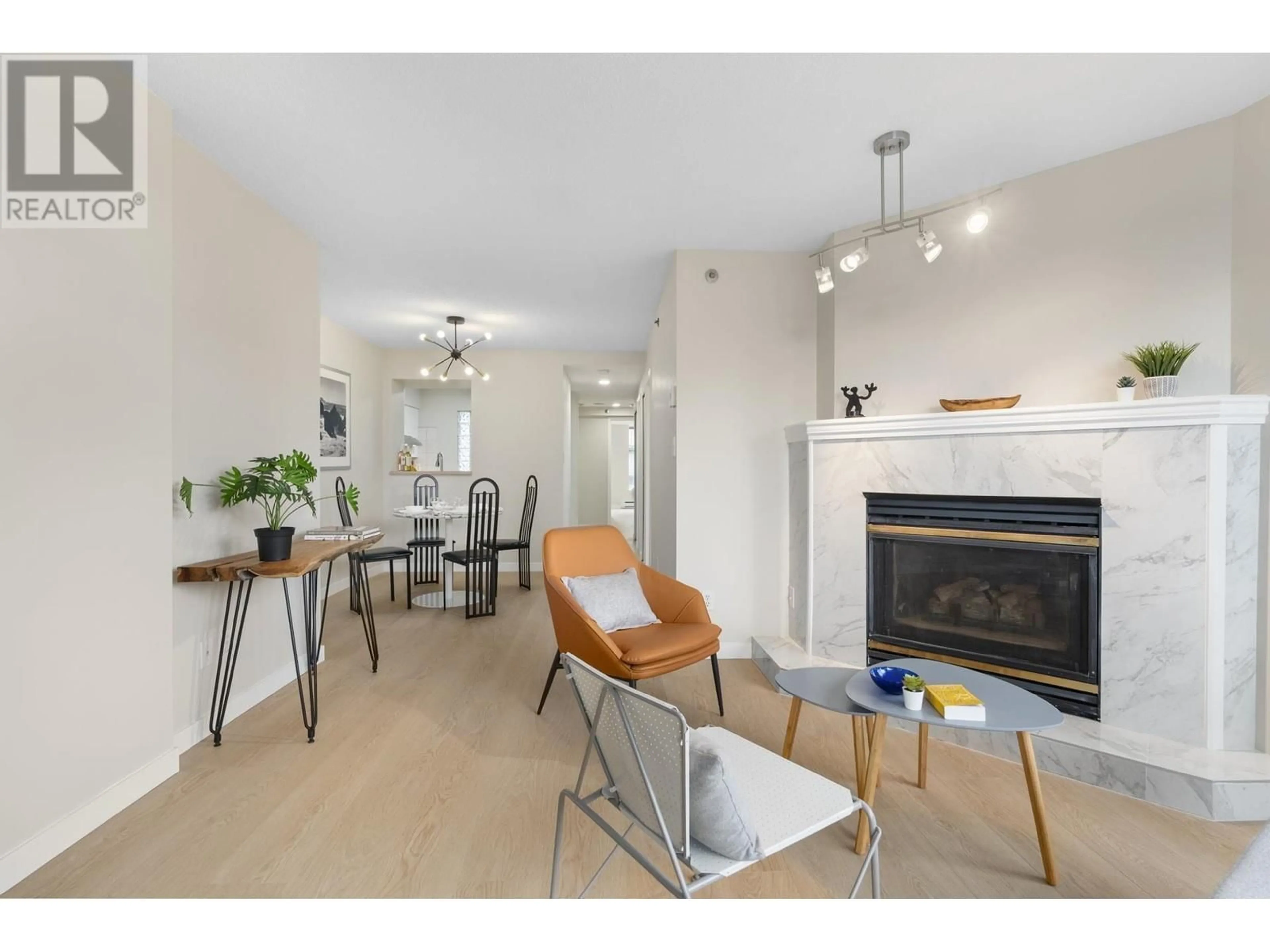 Living room with furniture, wood/laminate floor for 603 1771 NELSON STREET, Vancouver British Columbia V6G1M6