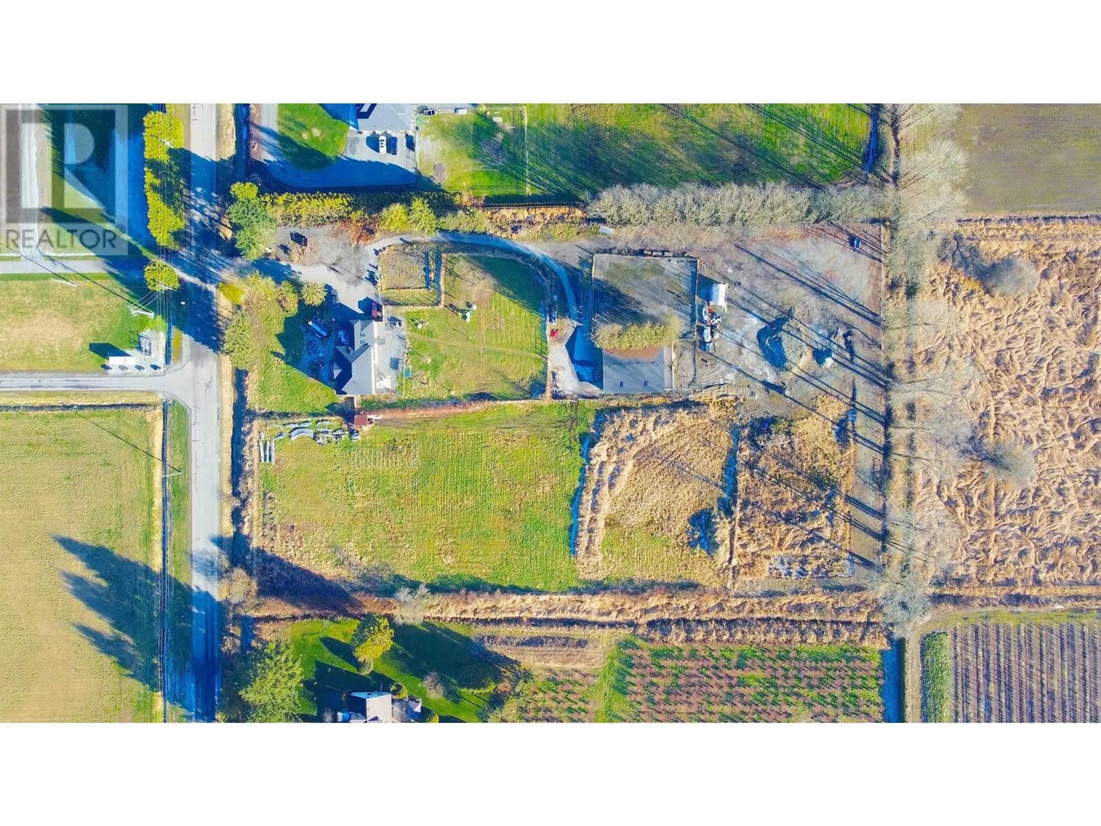 A pic from outside/outdoor area/front of a property/back of a property/a pic from drone, street for 19682 RICHARDSON ROAD, Pitt Meadows British Columbia V3Y1Z1