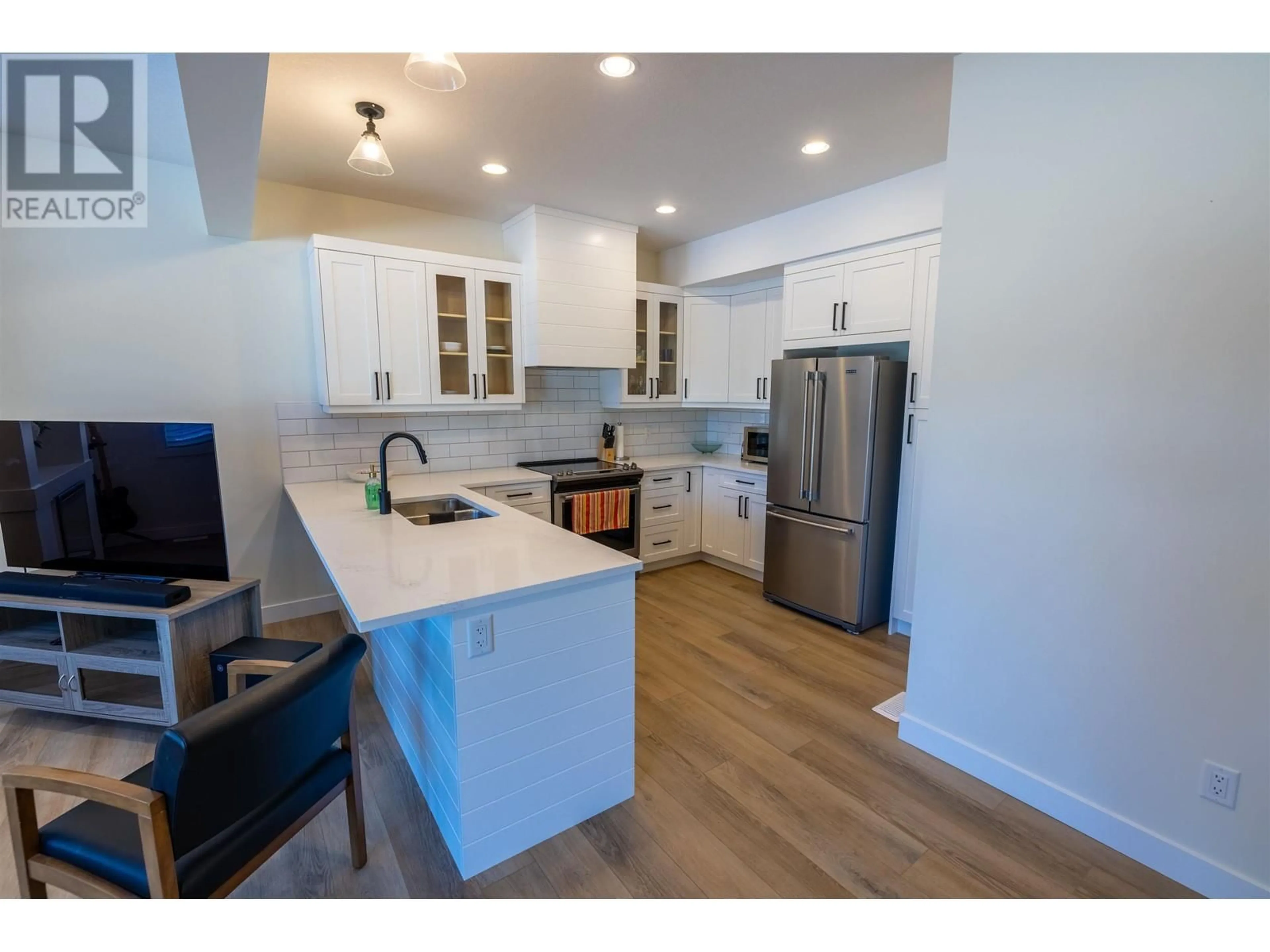 Open concept kitchen, wood/laminate floor for 710 - 4274 22ND AVENUE, Prince George British Columbia V2N0J4