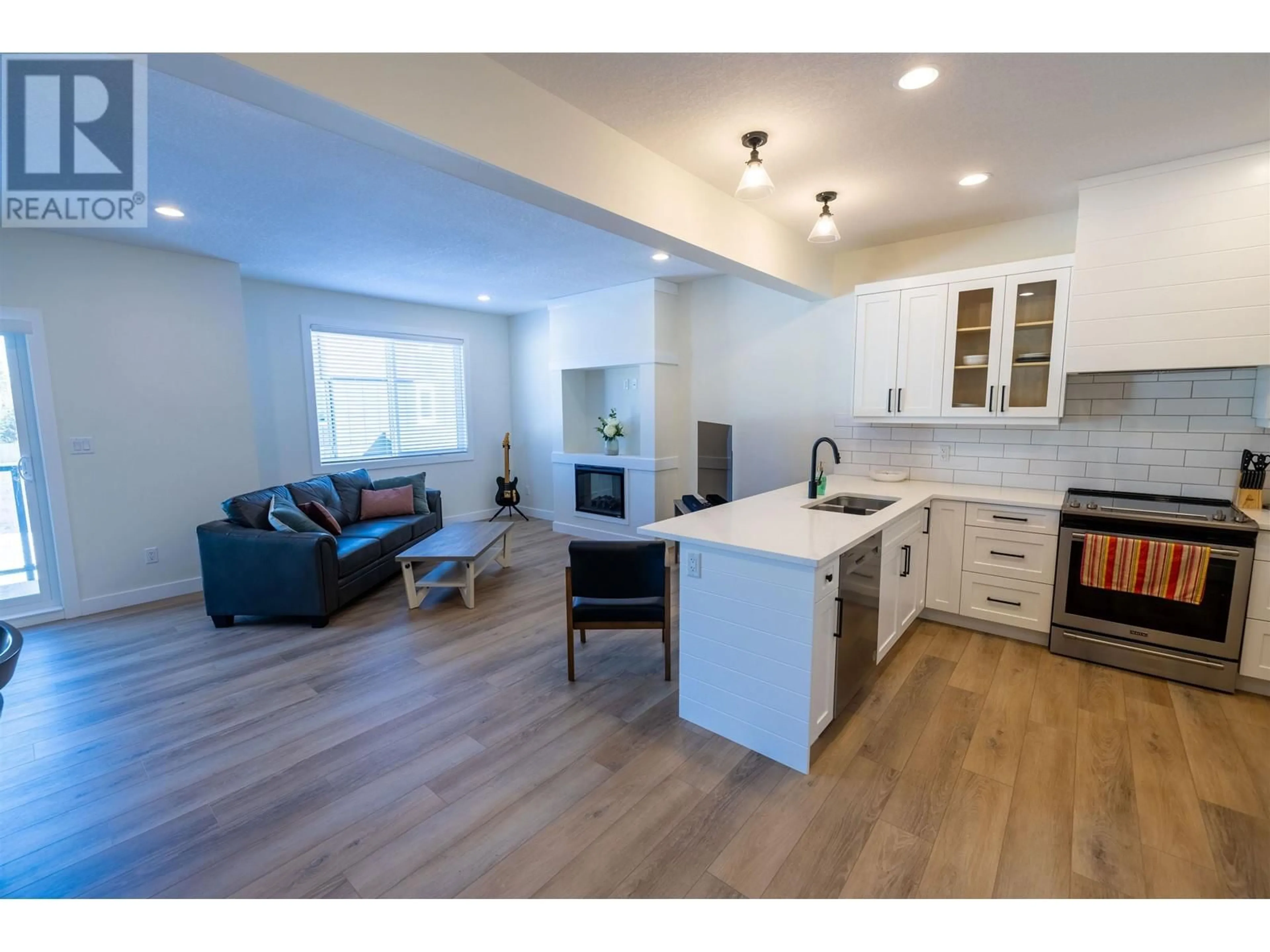 Open concept kitchen, wood/laminate floor for 710 - 4274 22ND AVENUE, Prince George British Columbia V2N0J4