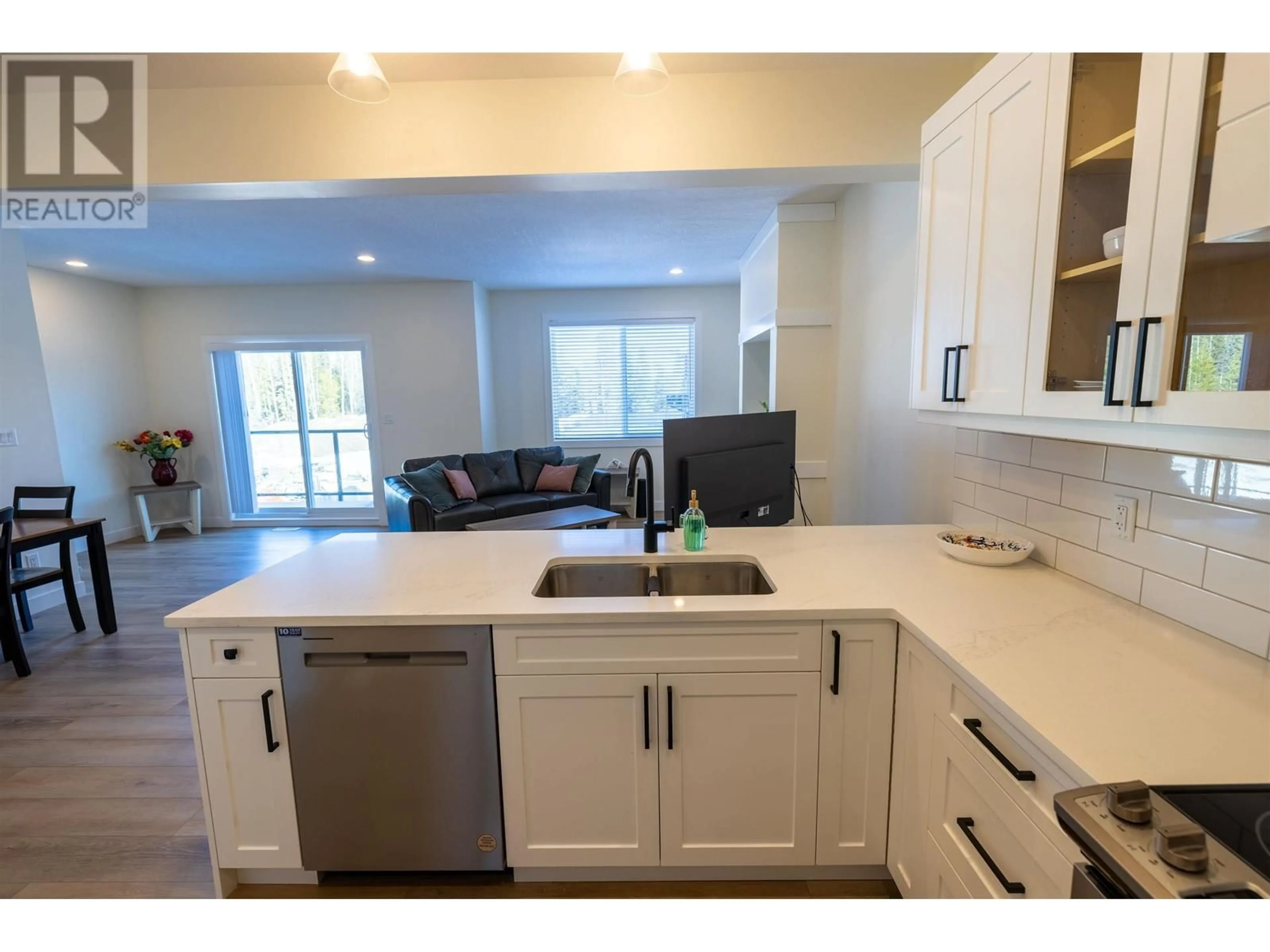 Open concept kitchen, ceramic/tile floor for 710 - 4274 22ND AVENUE, Prince George British Columbia V2N0J4