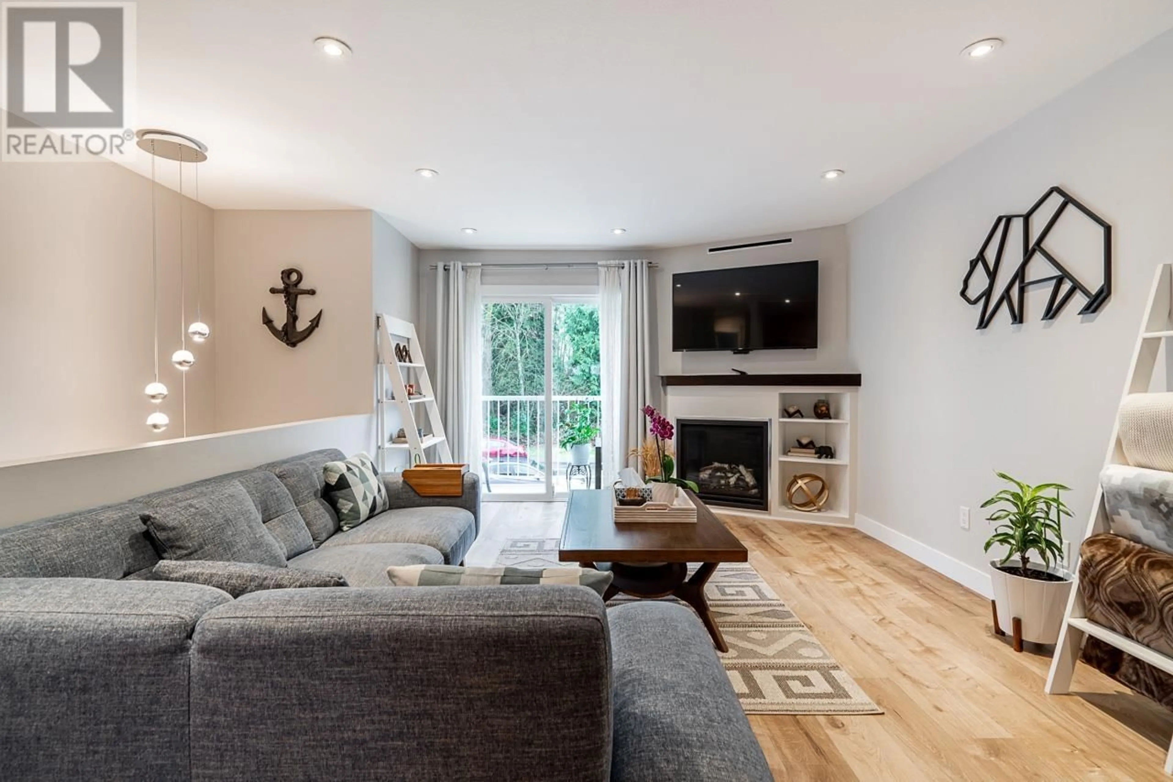 Living room with furniture, wood/laminate floor for 1473 LINCOLN DRIVE, Port Coquitlam British Columbia V3B7H1