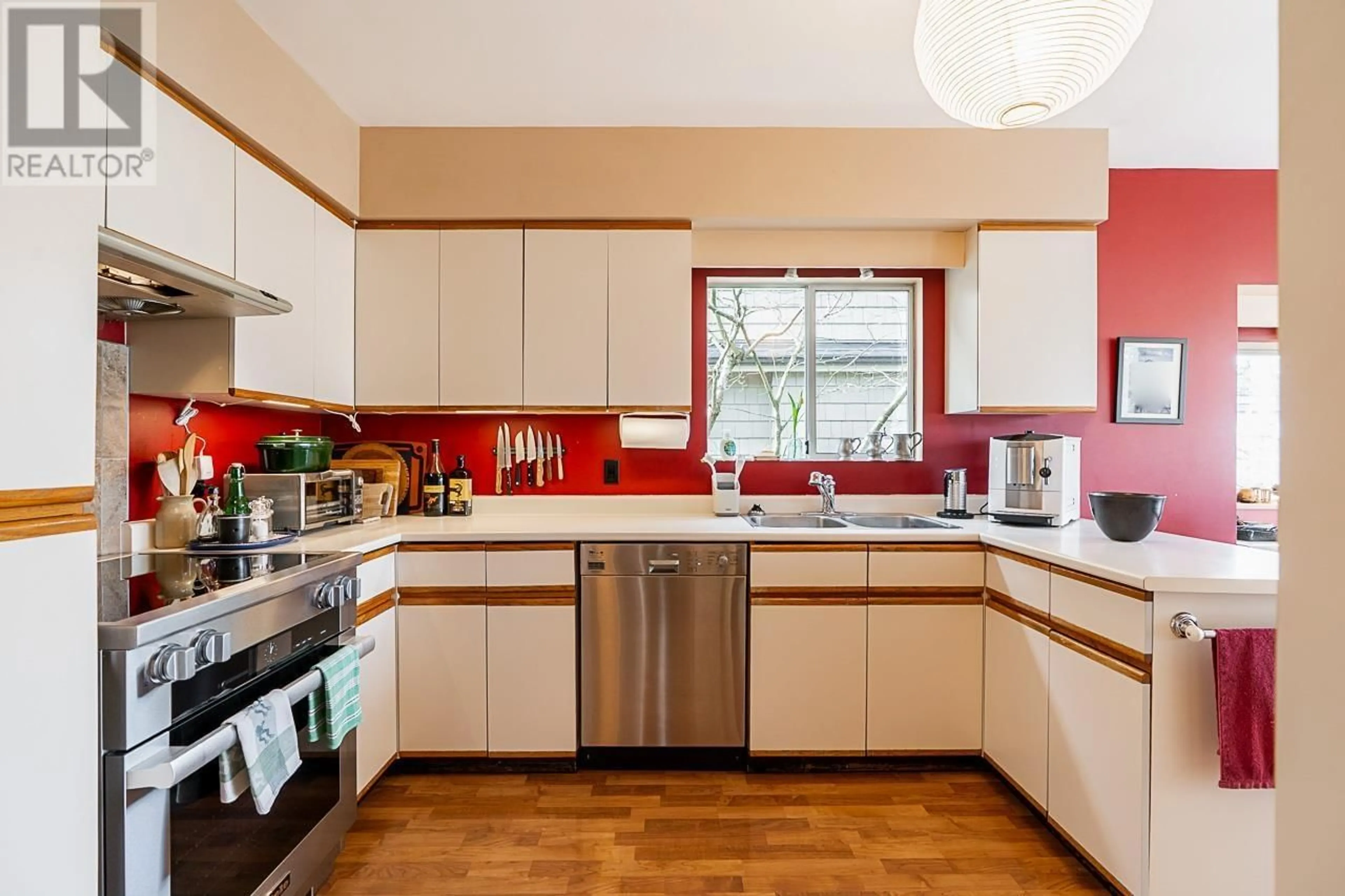 Contemporary kitchen, unknown for 4463 W 14TH AVENUE, Vancouver British Columbia V6R2Y2