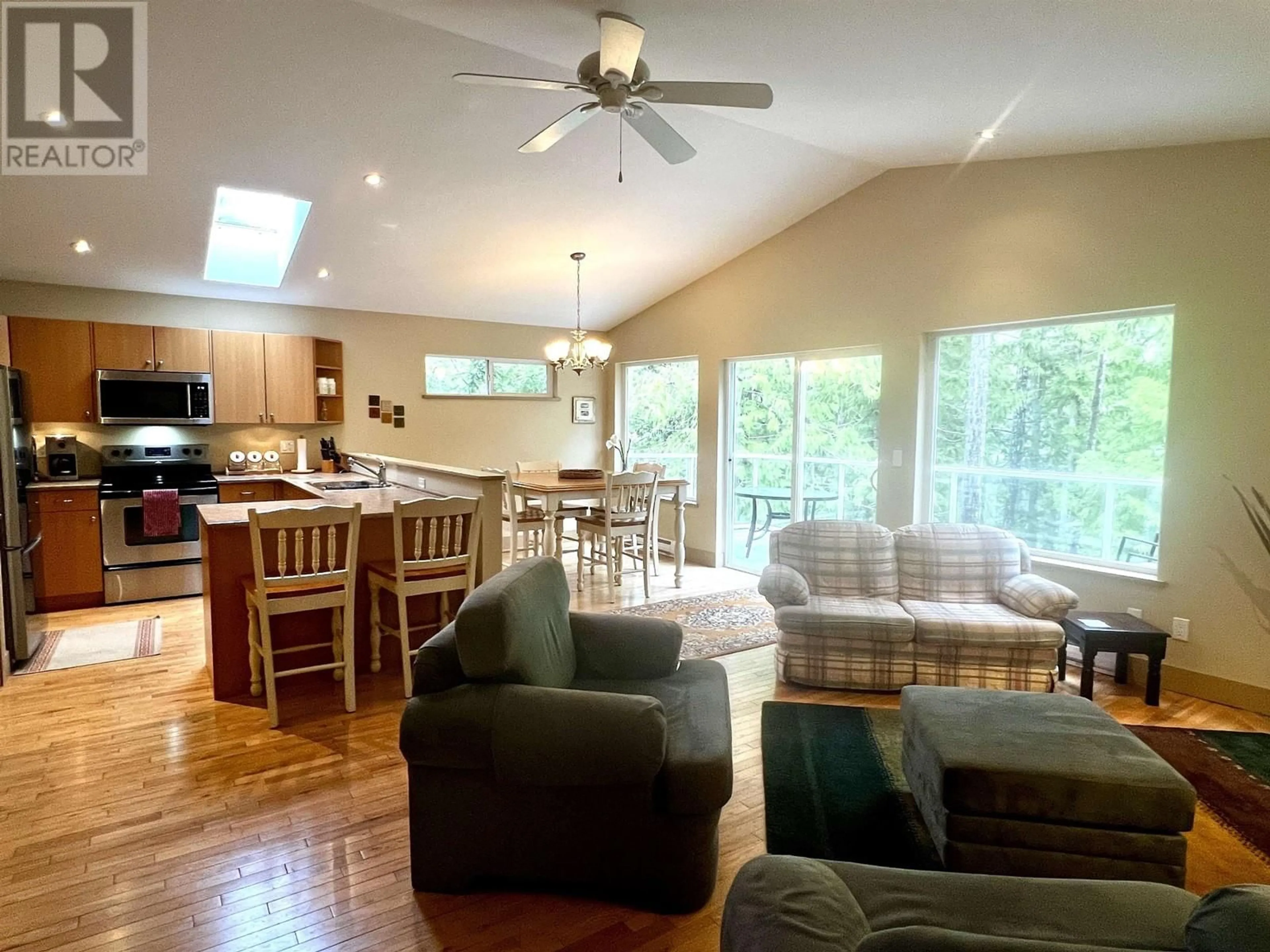 Living room with furniture, wood/laminate floor for 14 - 12710 LAGOON ROAD, Madeira Park British Columbia V0N2H1