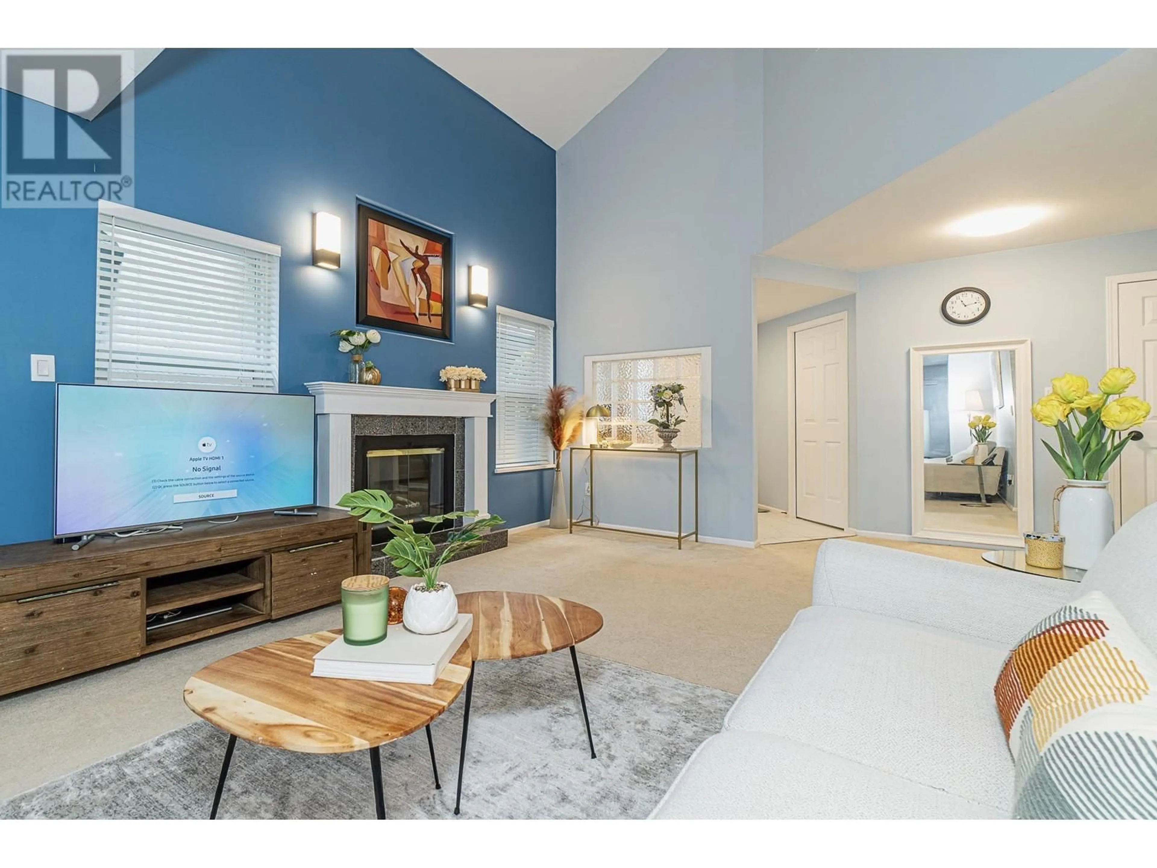 Living room with furniture, wood/laminate floor for 7 10900 NO. 2 ROAD, Richmond British Columbia V7E2E3