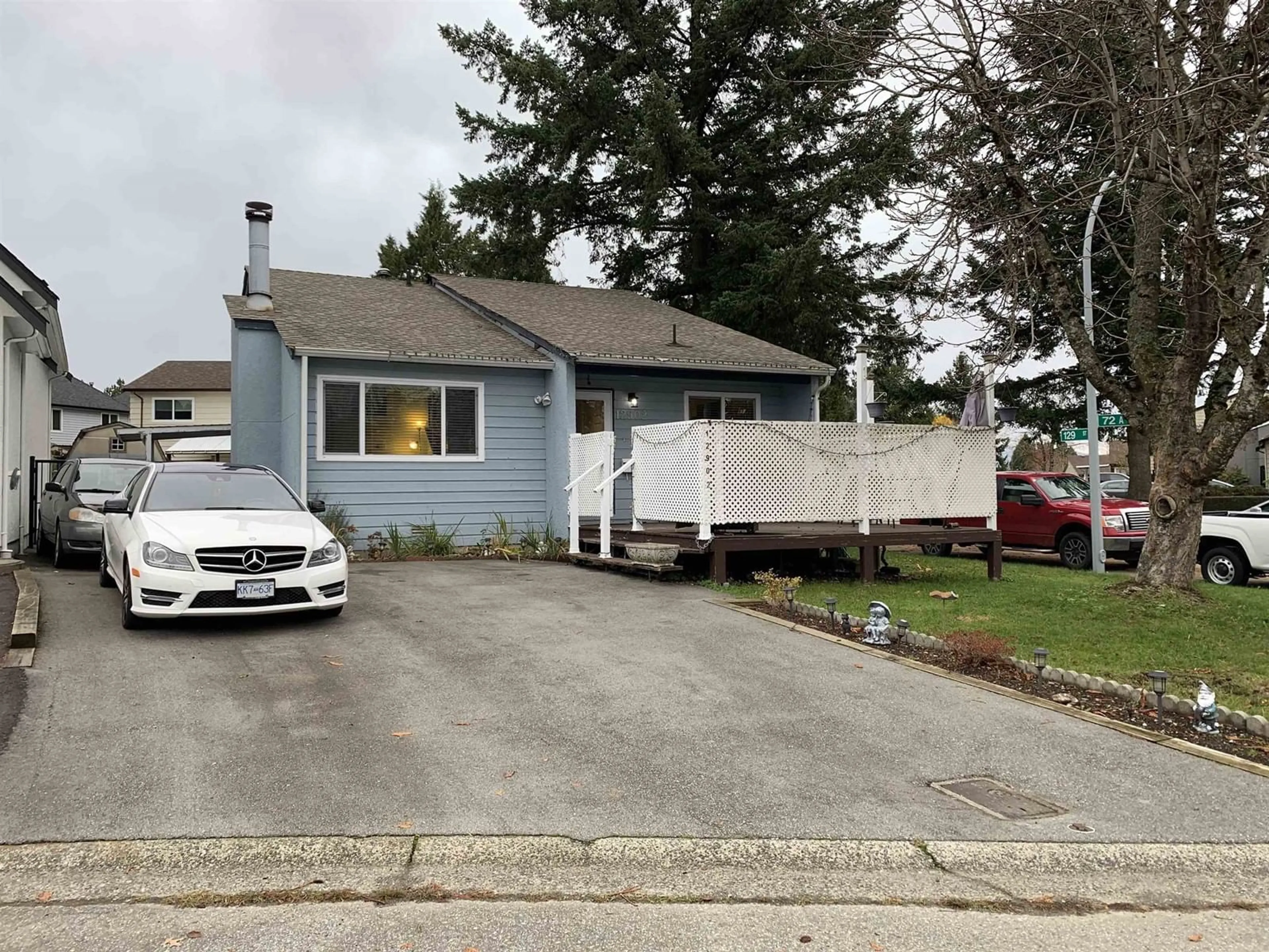 Home with vinyl exterior material, street for 12902 72A, Surrey British Columbia V3W6Z2