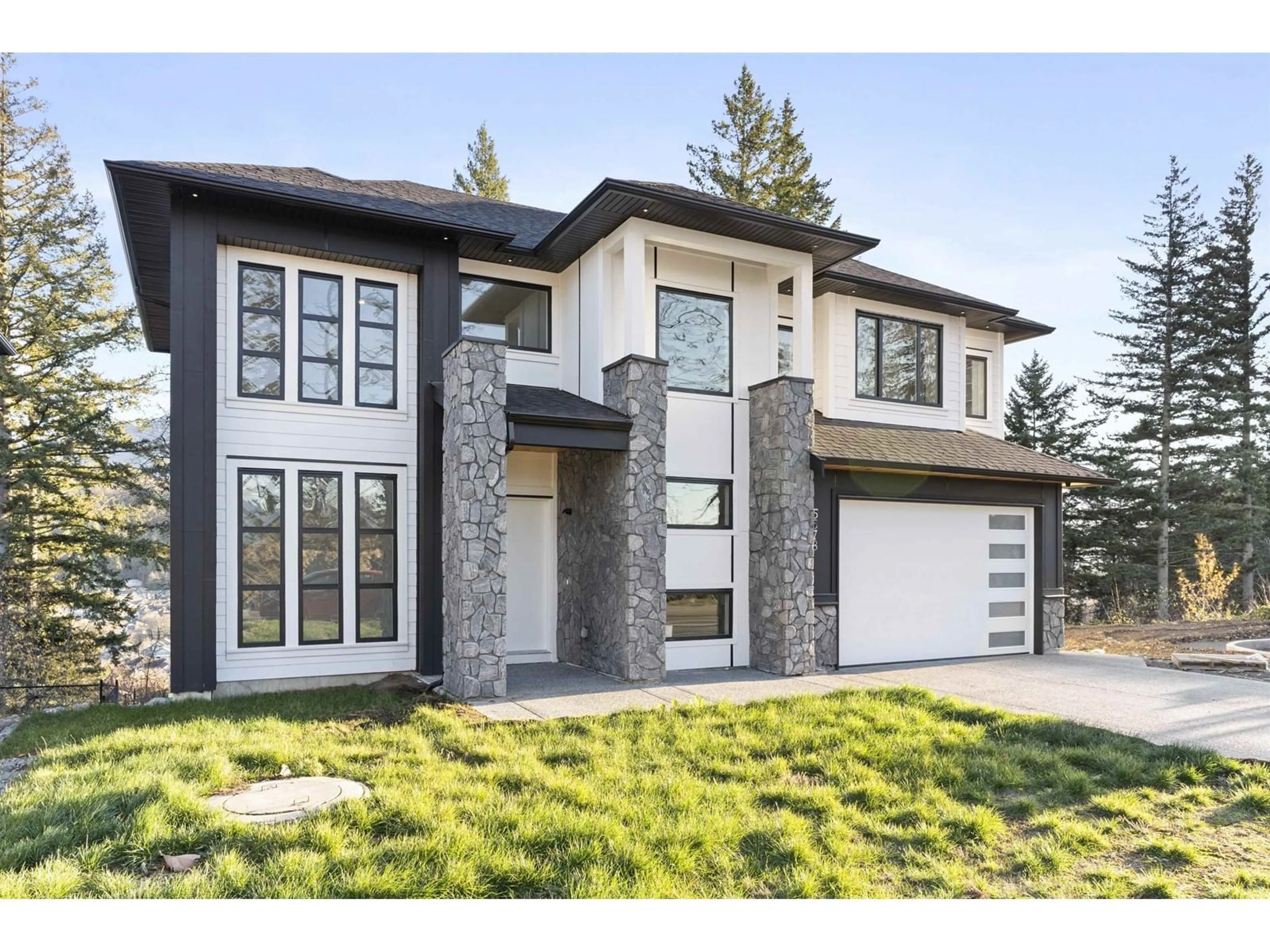 Home with brick exterior material, street for 5578 CRIMSON RIDGE|Promontory, Chilliwack British Columbia V2R6H7