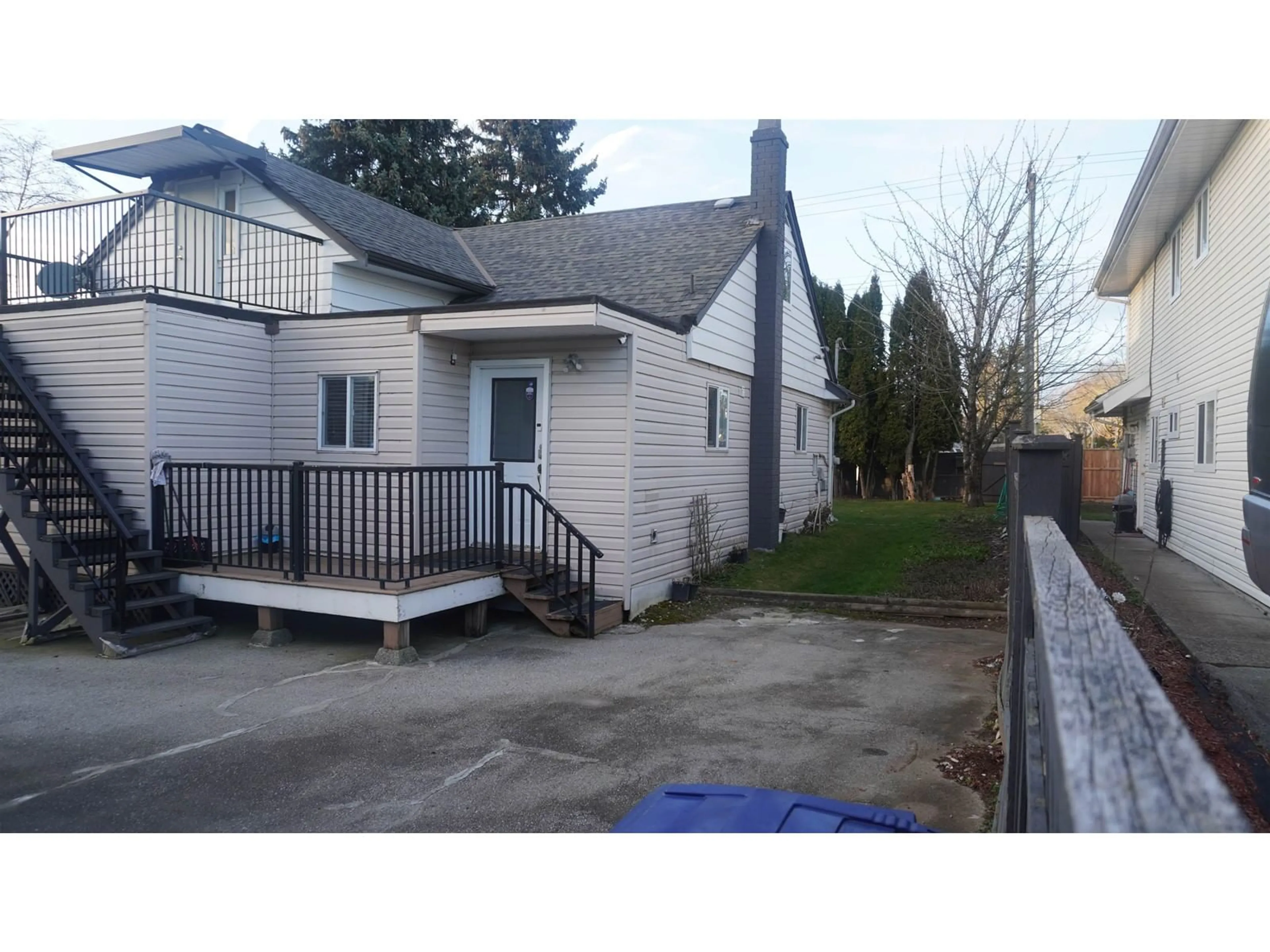 A pic from outside/outdoor area/front of a property/back of a property/a pic from drone, street for 12248 72 AVENUE, Surrey British Columbia V3W2M2