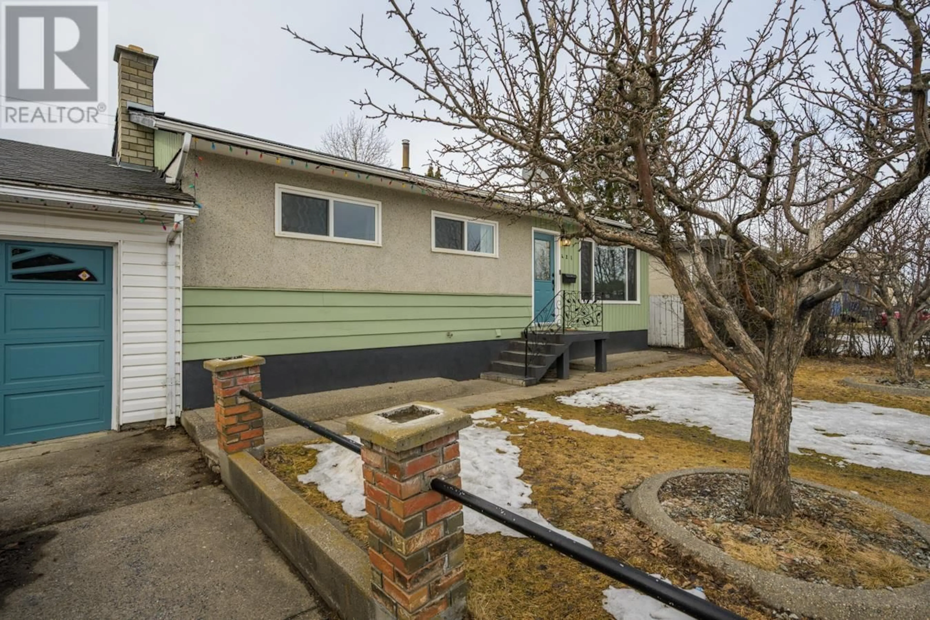 Home with vinyl exterior material, street for 421 NICHOLSON STREET, Prince George British Columbia V2M3L8