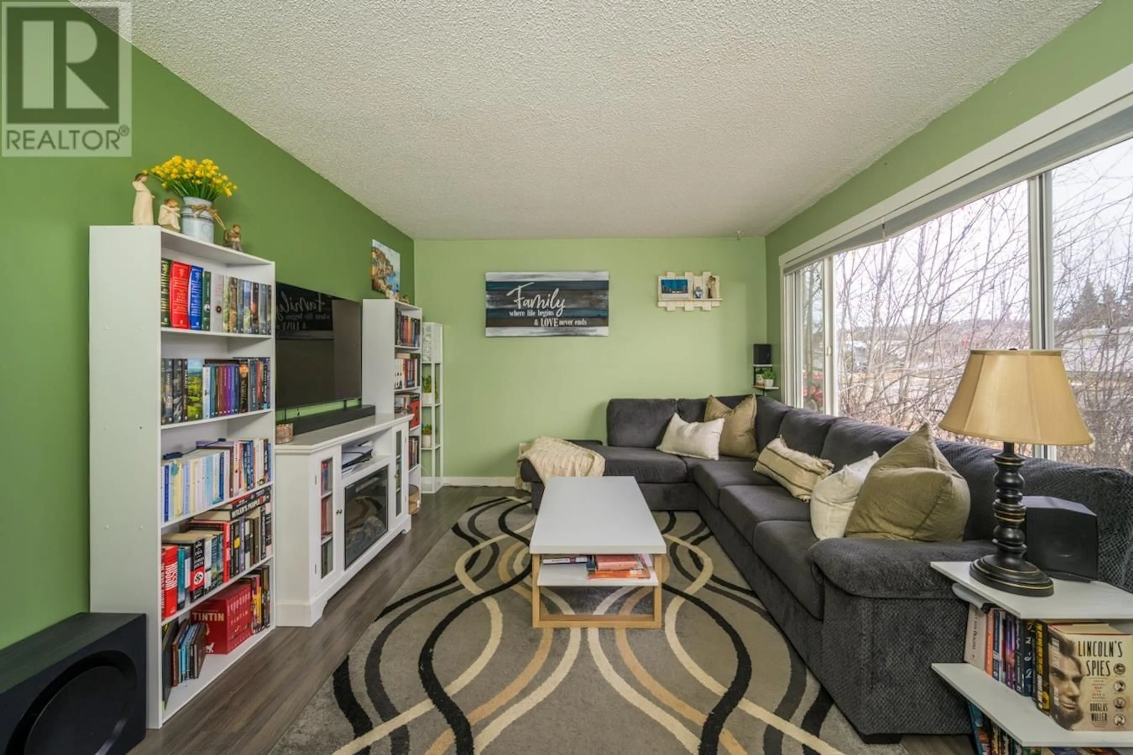 Living room with furniture, wood/laminate floor for 421 NICHOLSON STREET, Prince George British Columbia V2M3L8