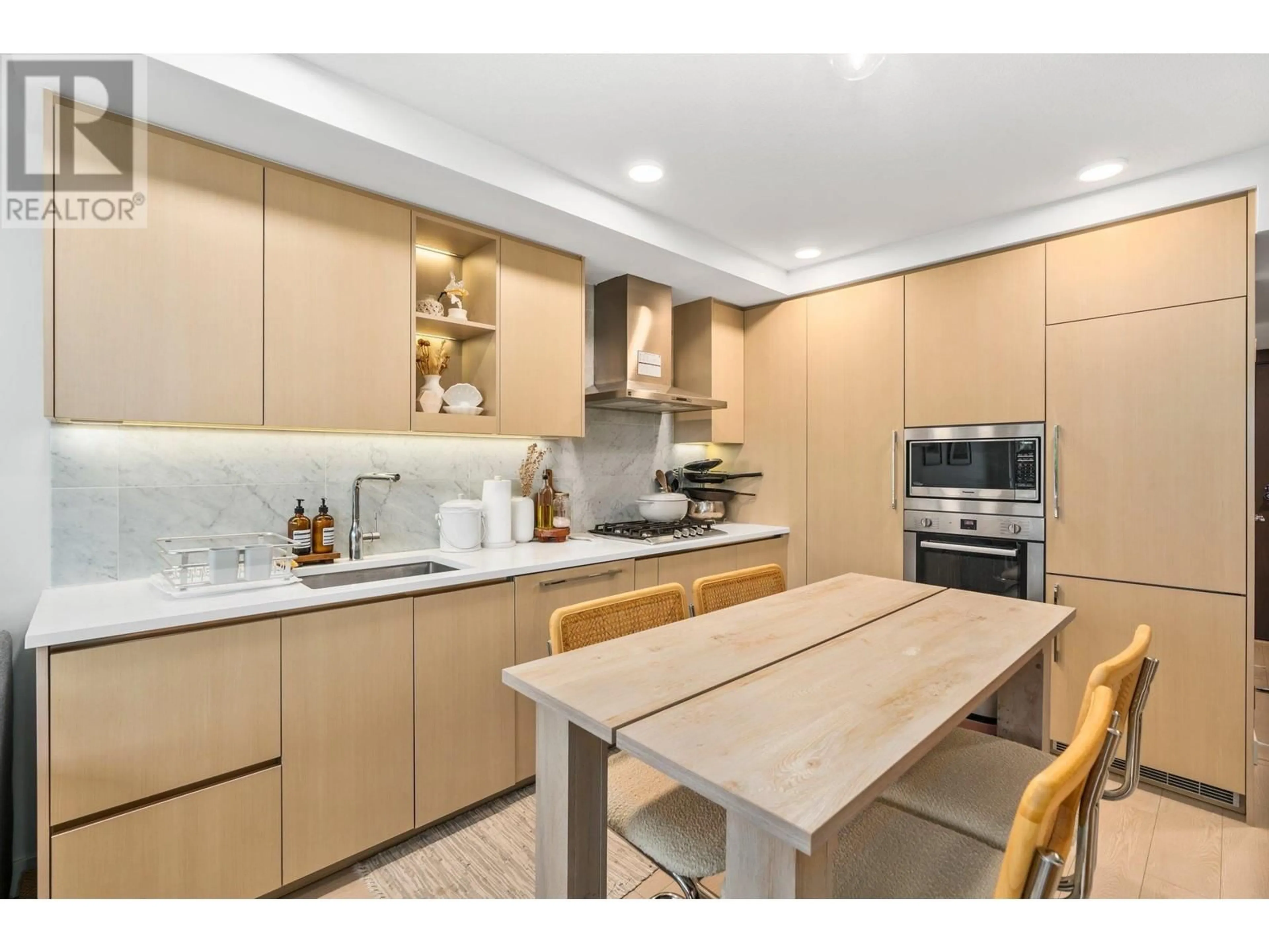 Open concept kitchen, unknown for 716 - 8800 HAZELBRIDGE WAY, Richmond British Columbia V6X0S3