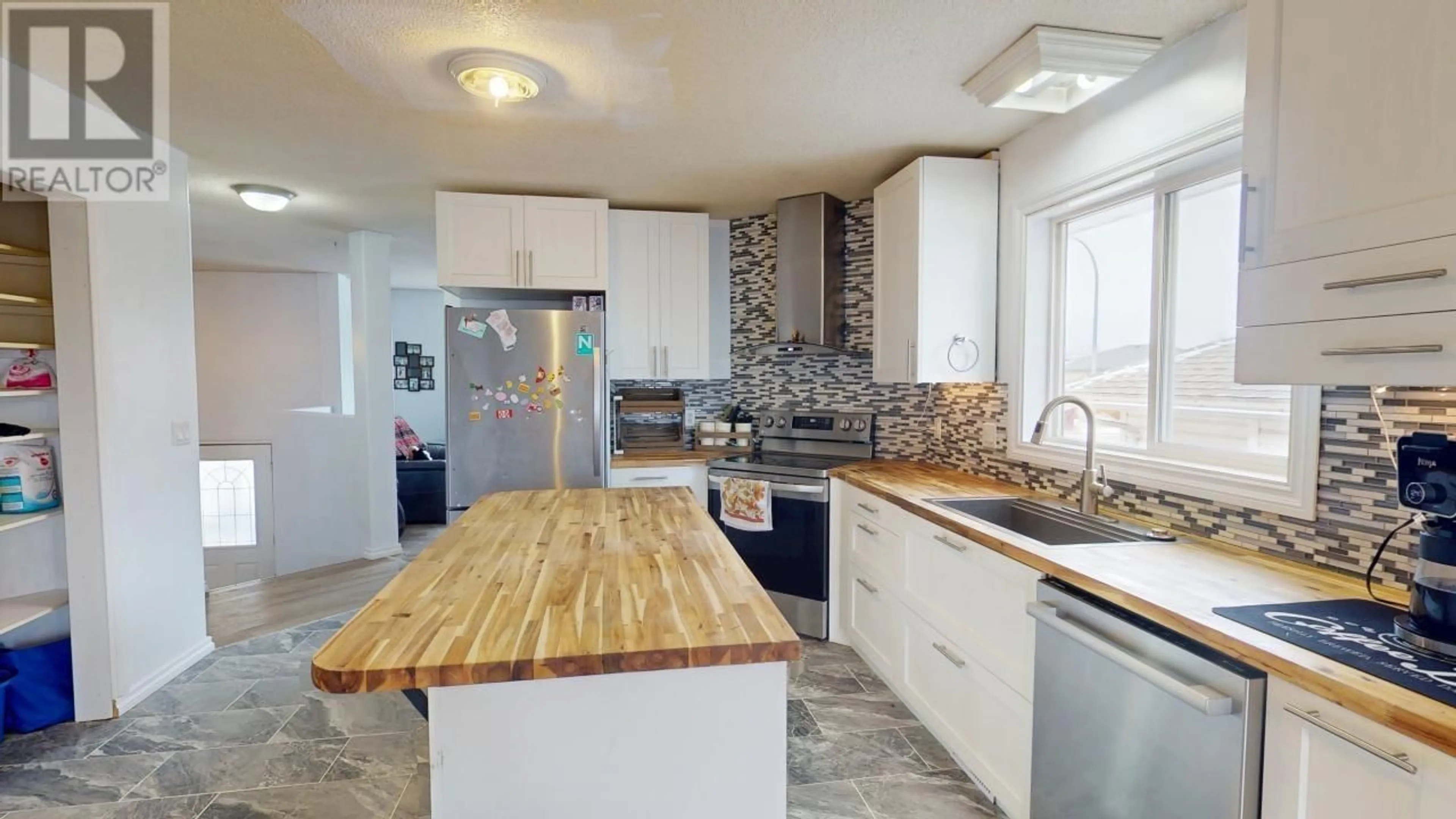 Open concept kitchen, unknown for 11419 98 STREET, Fort St. John British Columbia V1J7B5