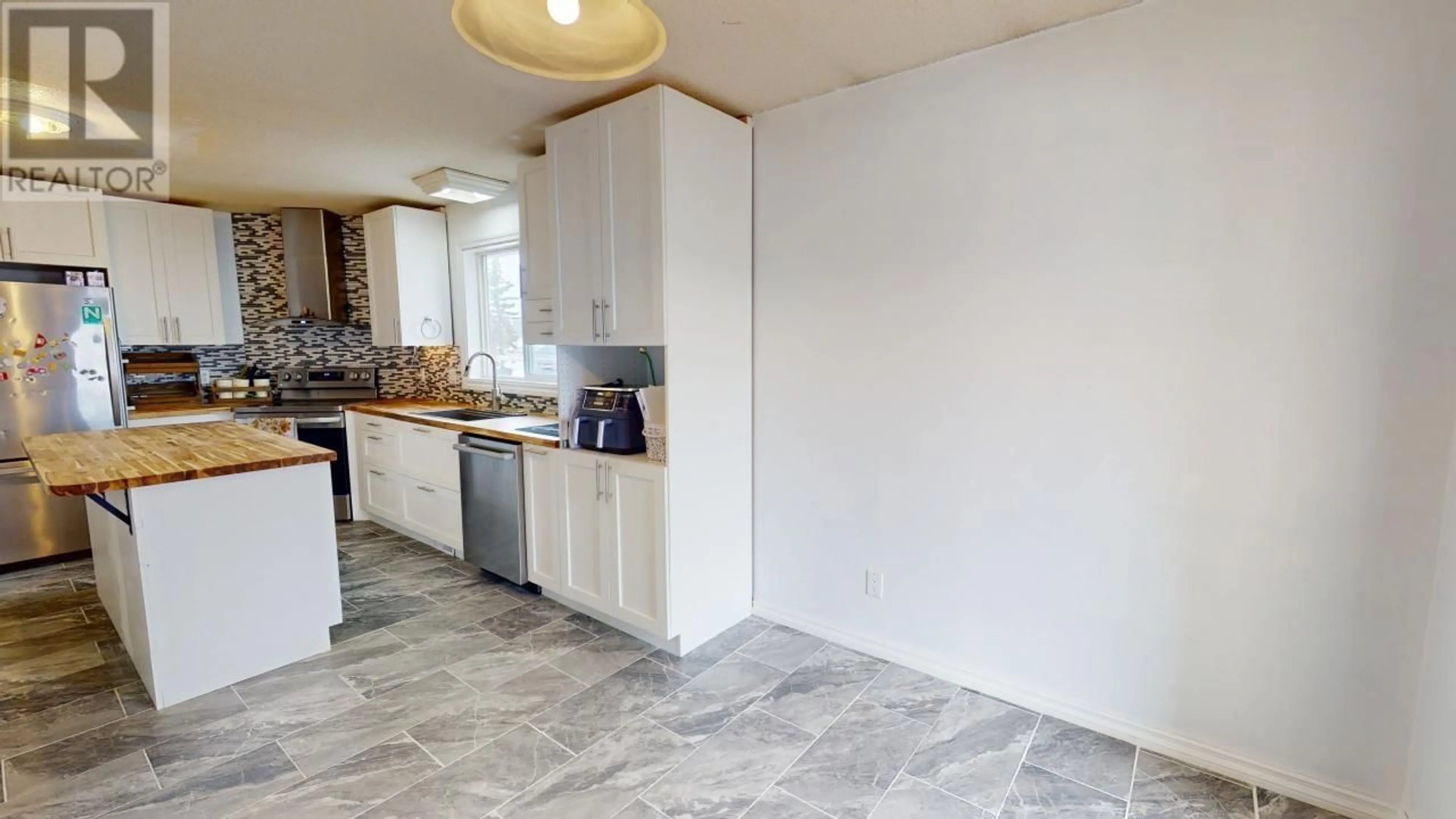 Standard kitchen, ceramic/tile floor for 11419 98 STREET, Fort St. John British Columbia V1J7B5