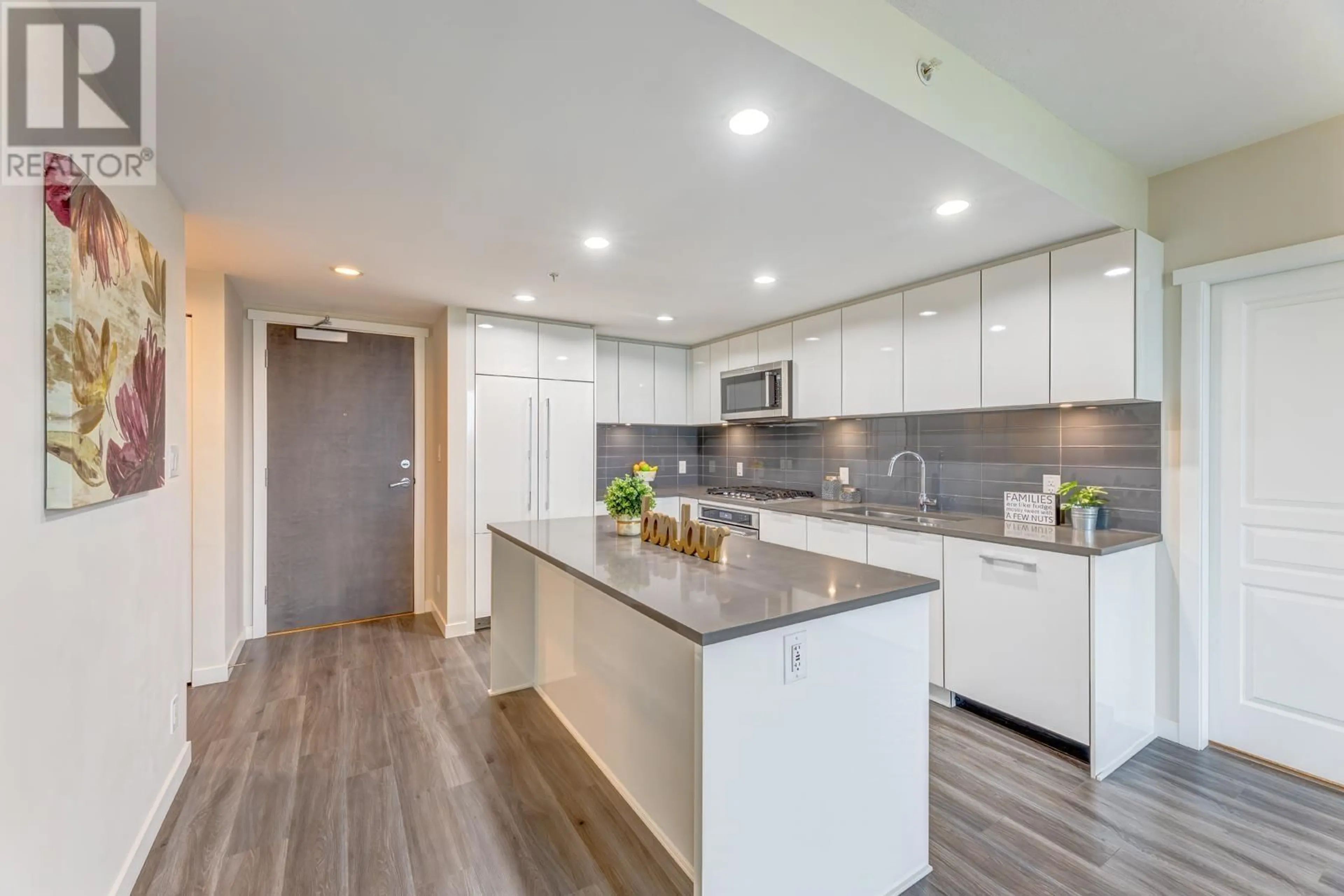 Open concept kitchen, wood/laminate floor for 1605 3096 WINDSOR GATE, Coquitlam British Columbia V3B0P4