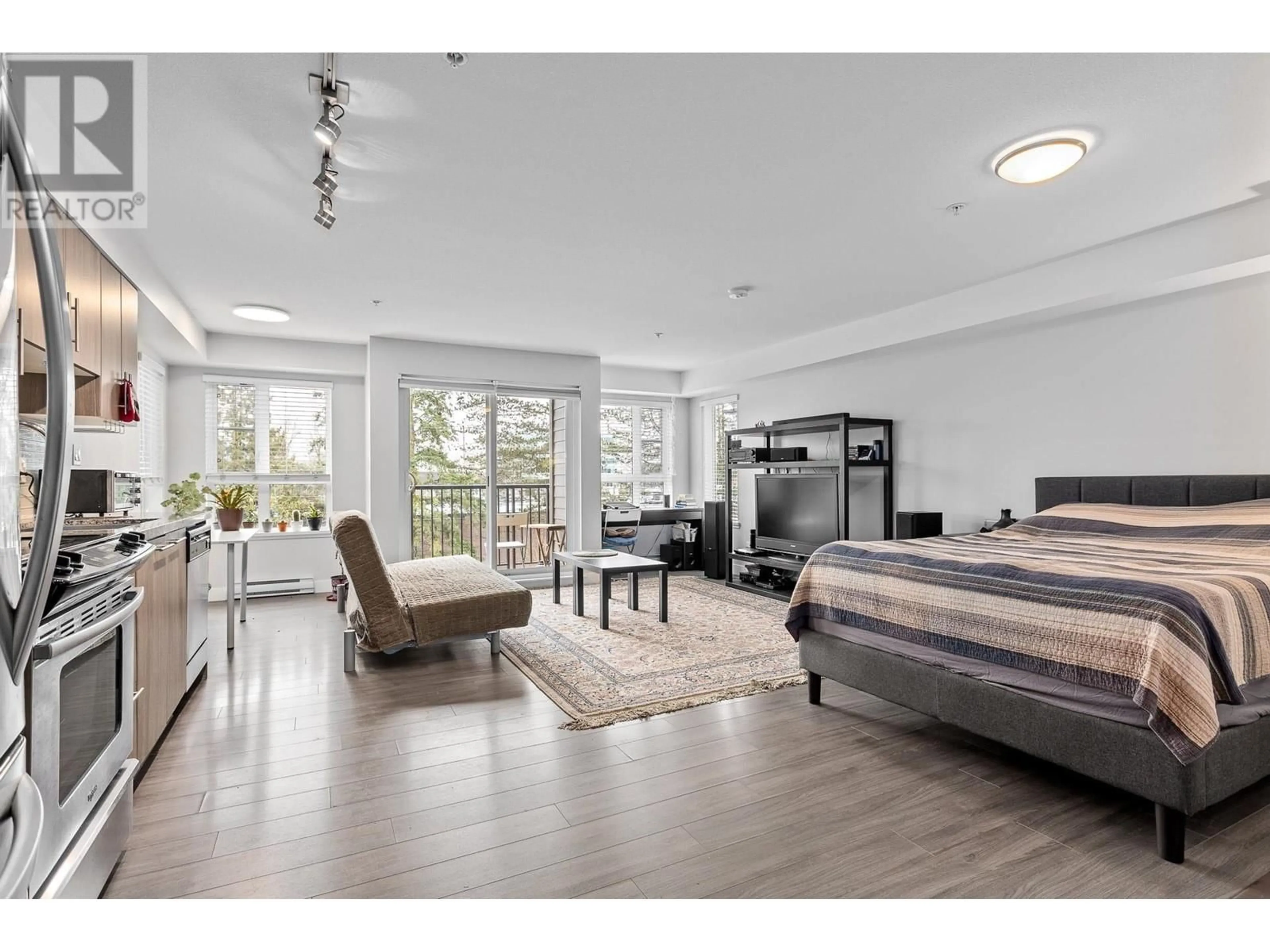 Living room with furniture, wood/laminate floor for 315 12075 EDGE STREET, Maple Ridge British Columbia V2X9E6