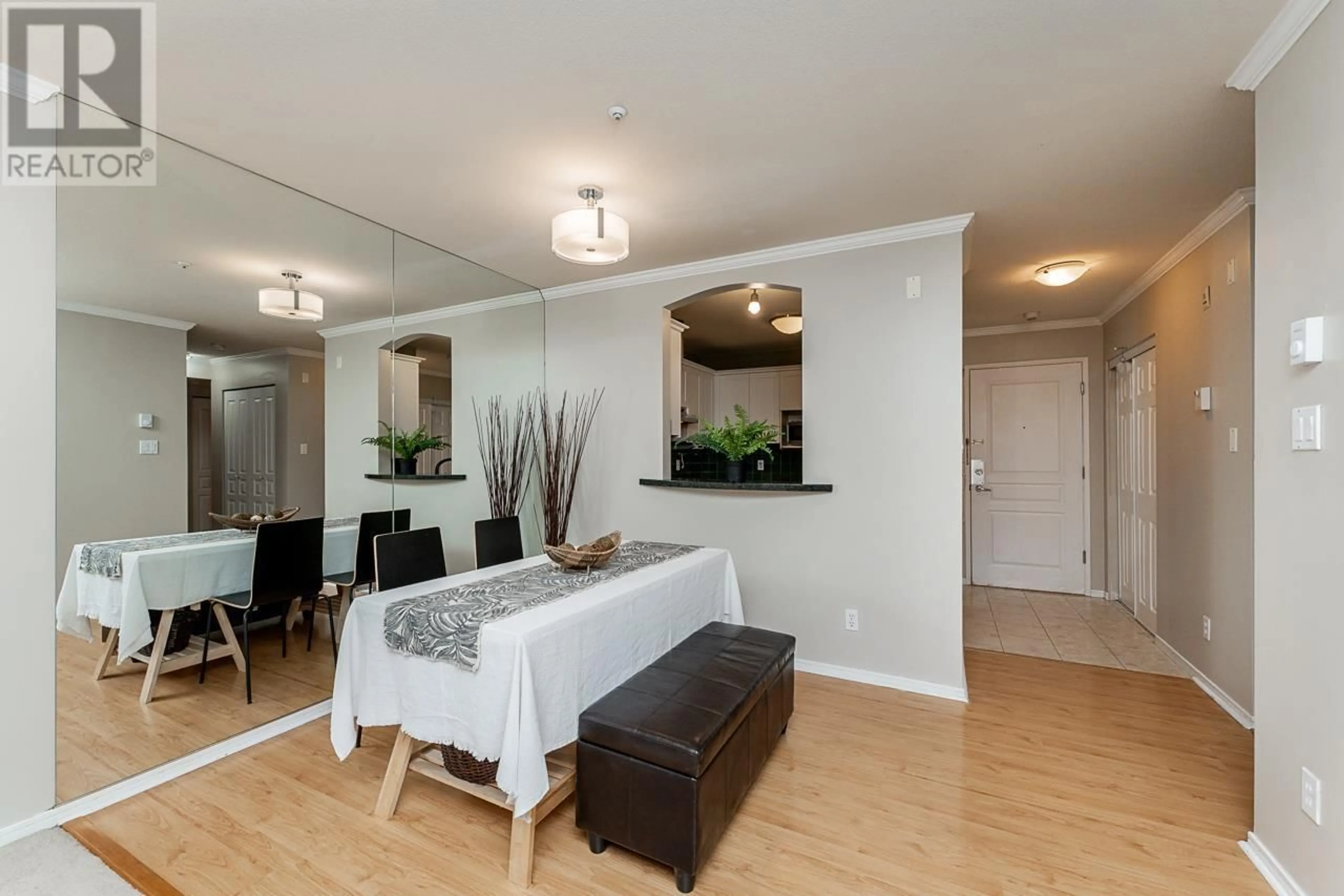 Dining room, wood/laminate floor for 106 8220 JONES ROAD, Richmond British Columbia V6Y3Z7