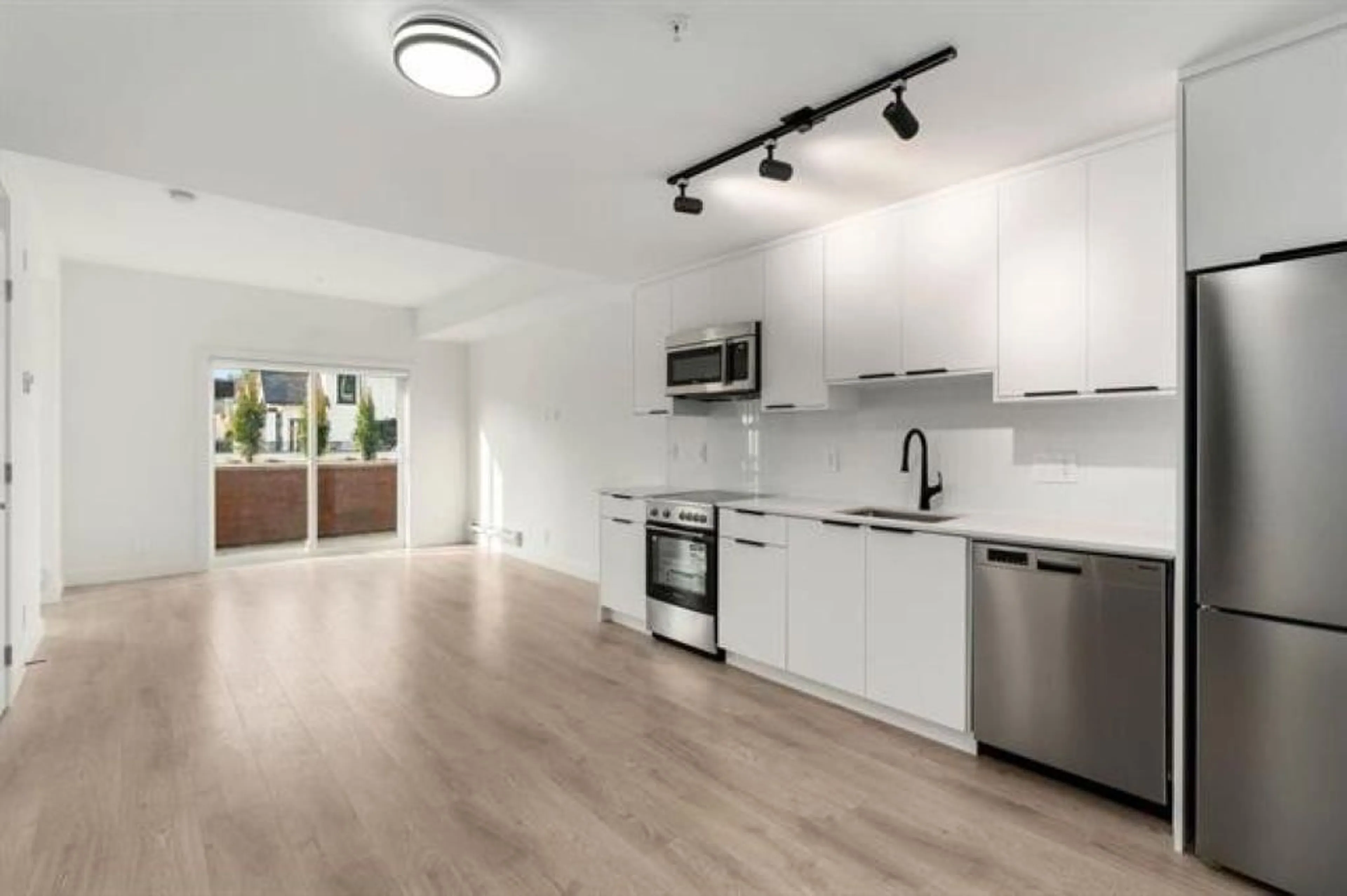 Open concept kitchen, unknown for 108 10616 132 STREET, Surrey British Columbia V3T3V8