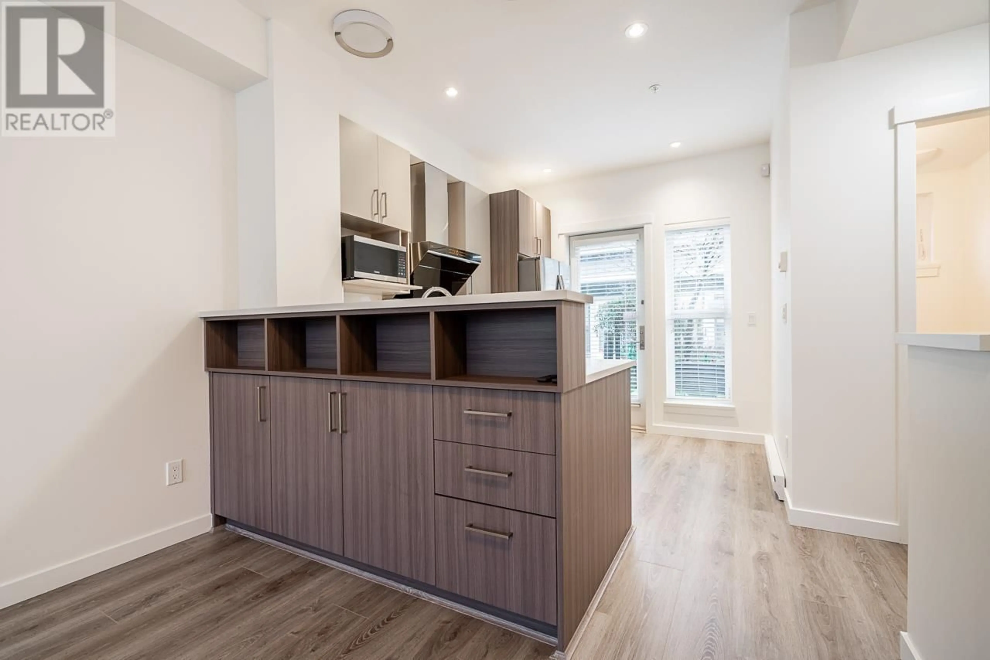 Open concept kitchen, wood/laminate floor for 9 8377 JONES ROAD, Richmond British Columbia V6Y1L5