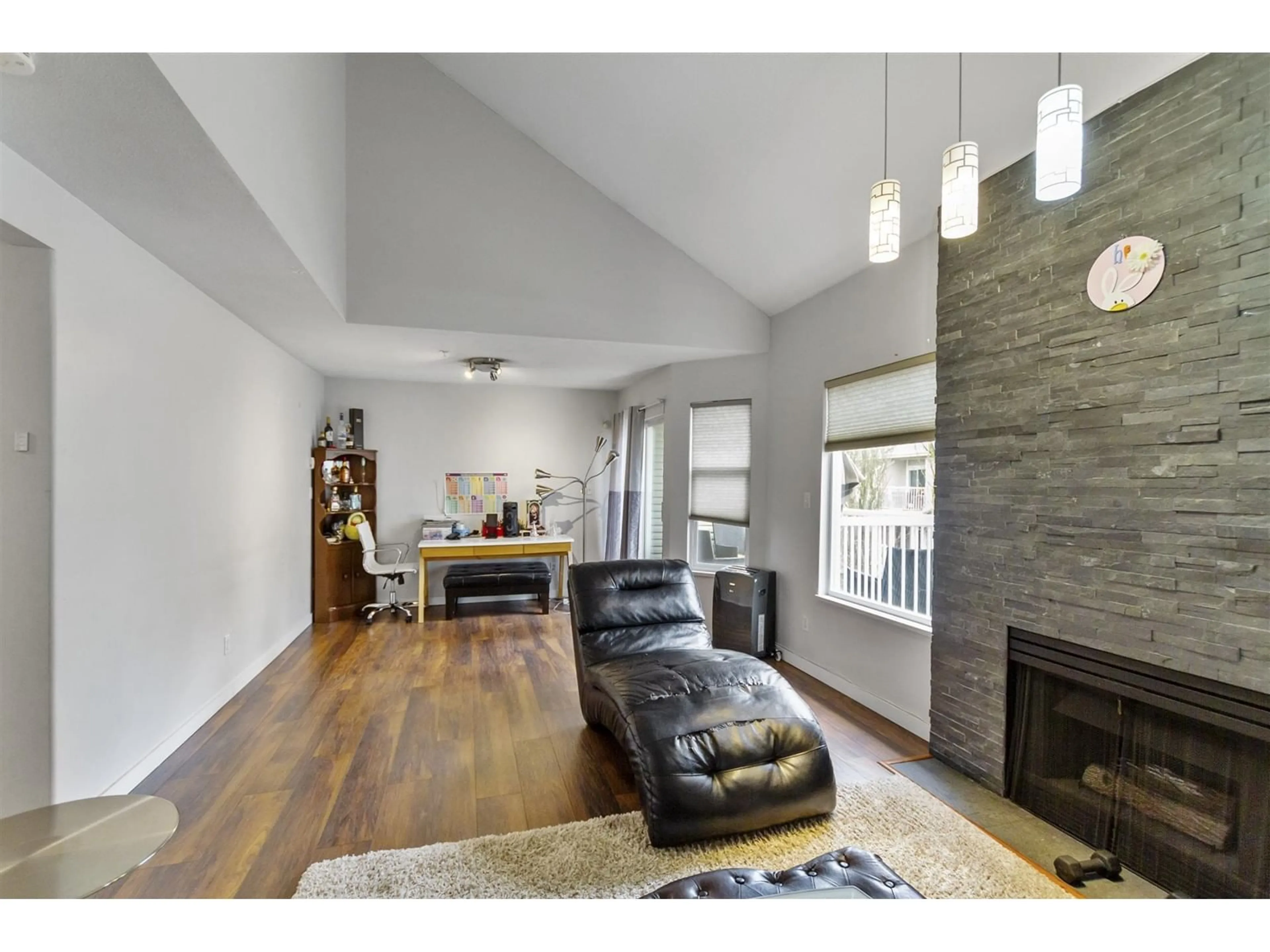 Living room with furniture, wood/laminate floor for 24 9036 208 STREET, Langley British Columbia V1M3K4