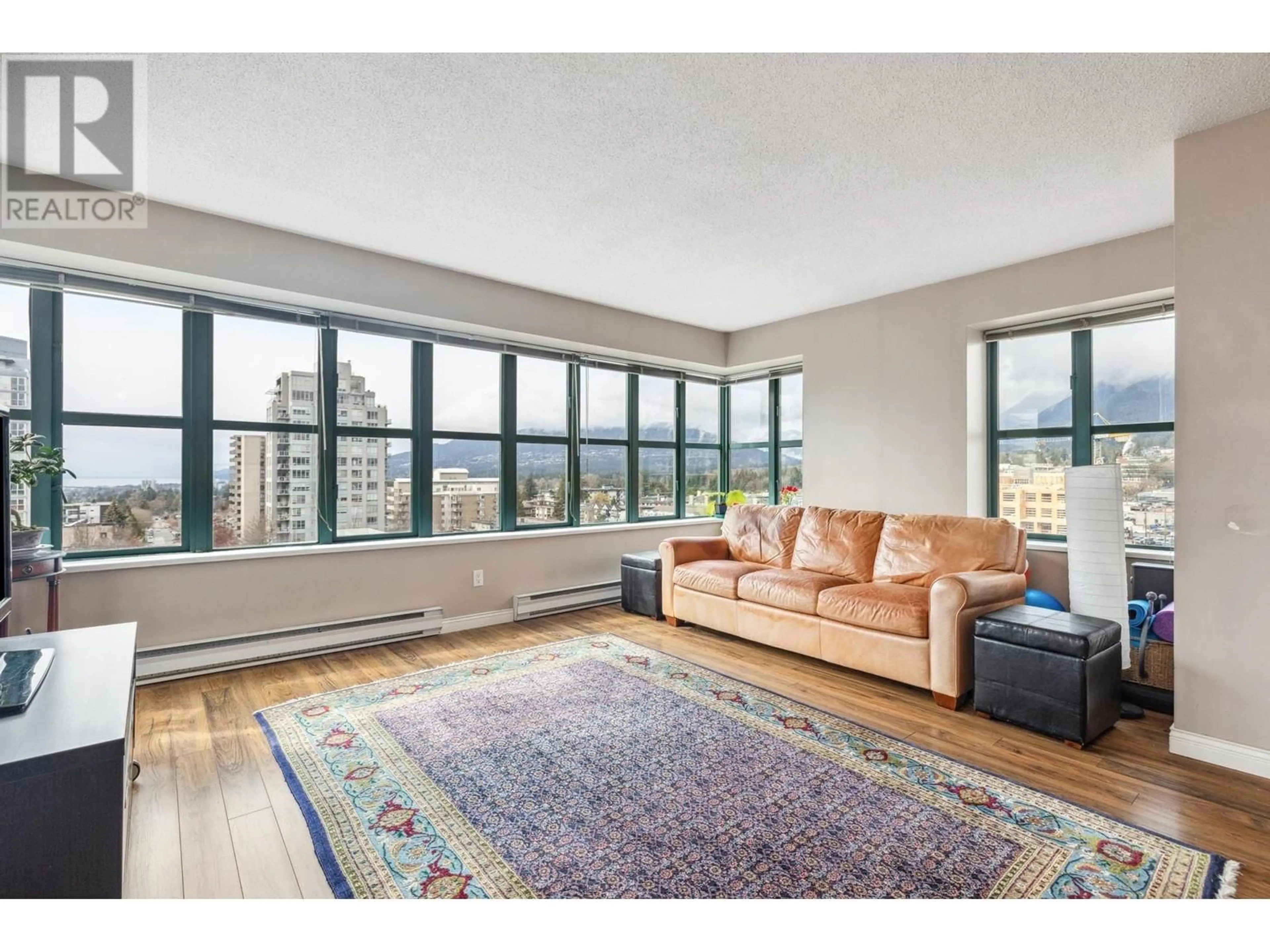 Living room with furniture, unknown for 801 - 1555 EASTERN AVENUE, North Vancouver British Columbia V7L3G2