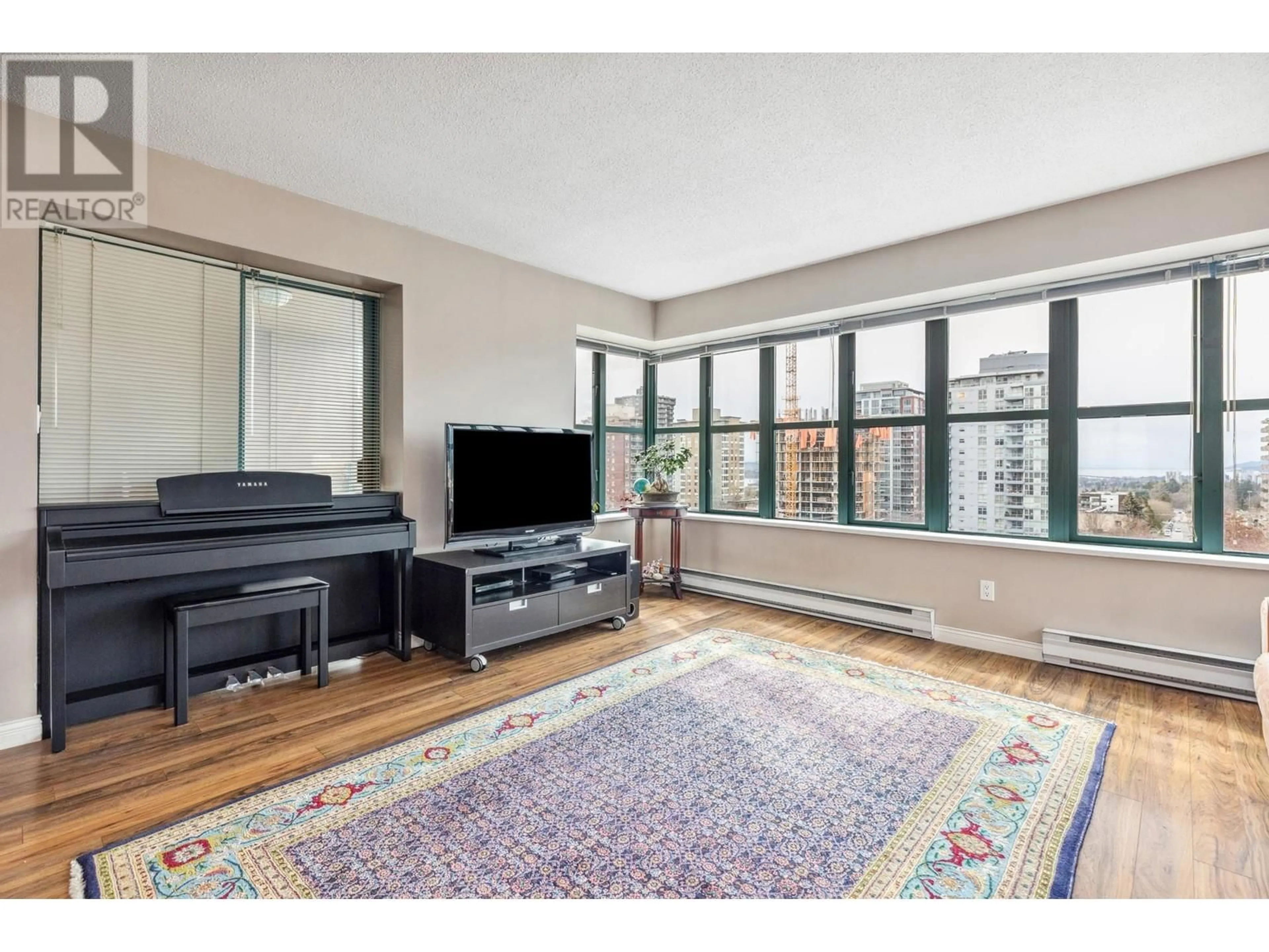 Living room with furniture, unknown for 801 - 1555 EASTERN AVENUE, North Vancouver British Columbia V7L3G2