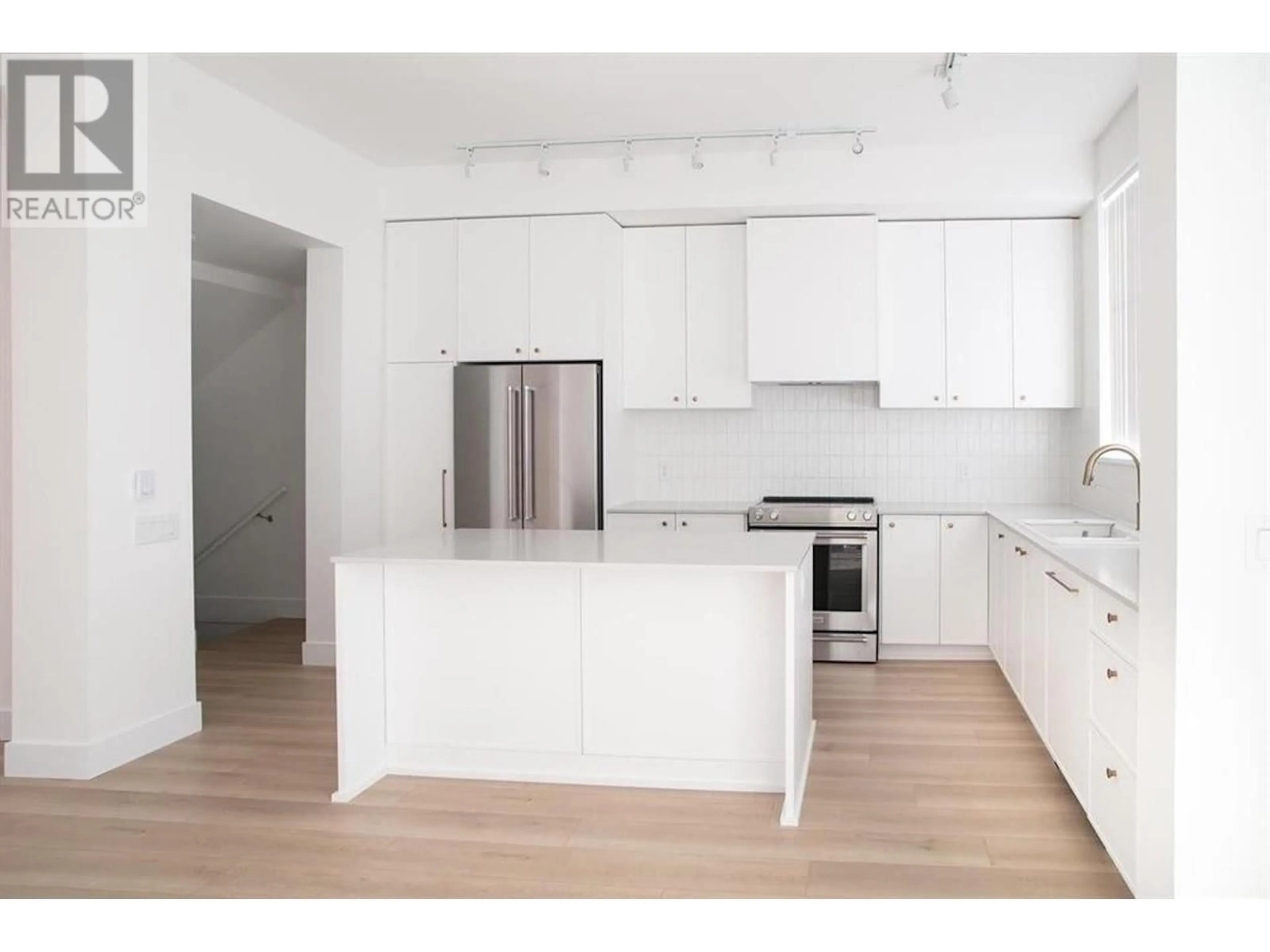 Open concept kitchen, wood/laminate floor for 189 - 1331 OLMSTED STREET, Coquitlam British Columbia V3E0T3
