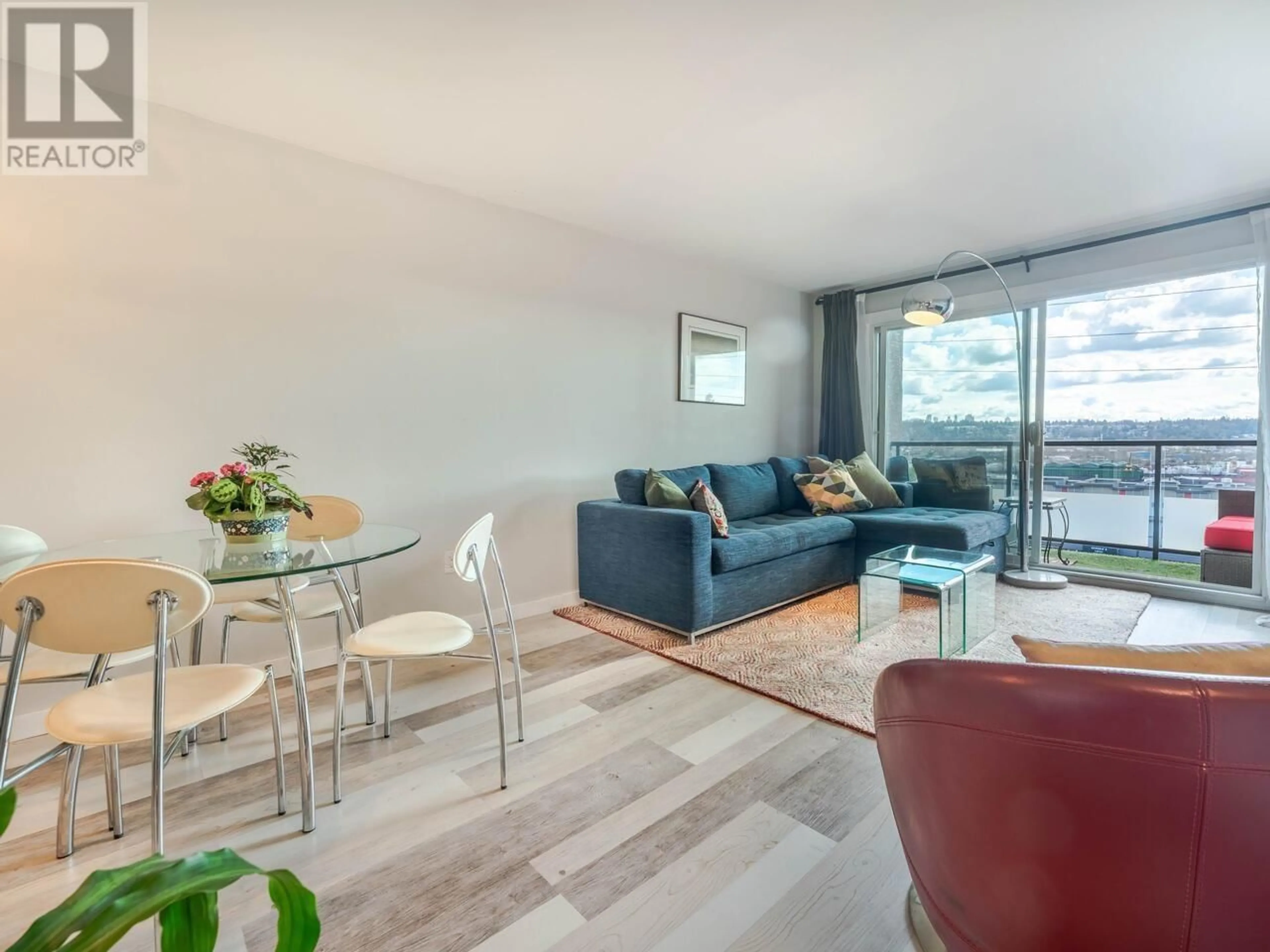 Living room with furniture, wood/laminate floor for 212 312 CARNARVON STREET, New Westminster British Columbia V3L5H6