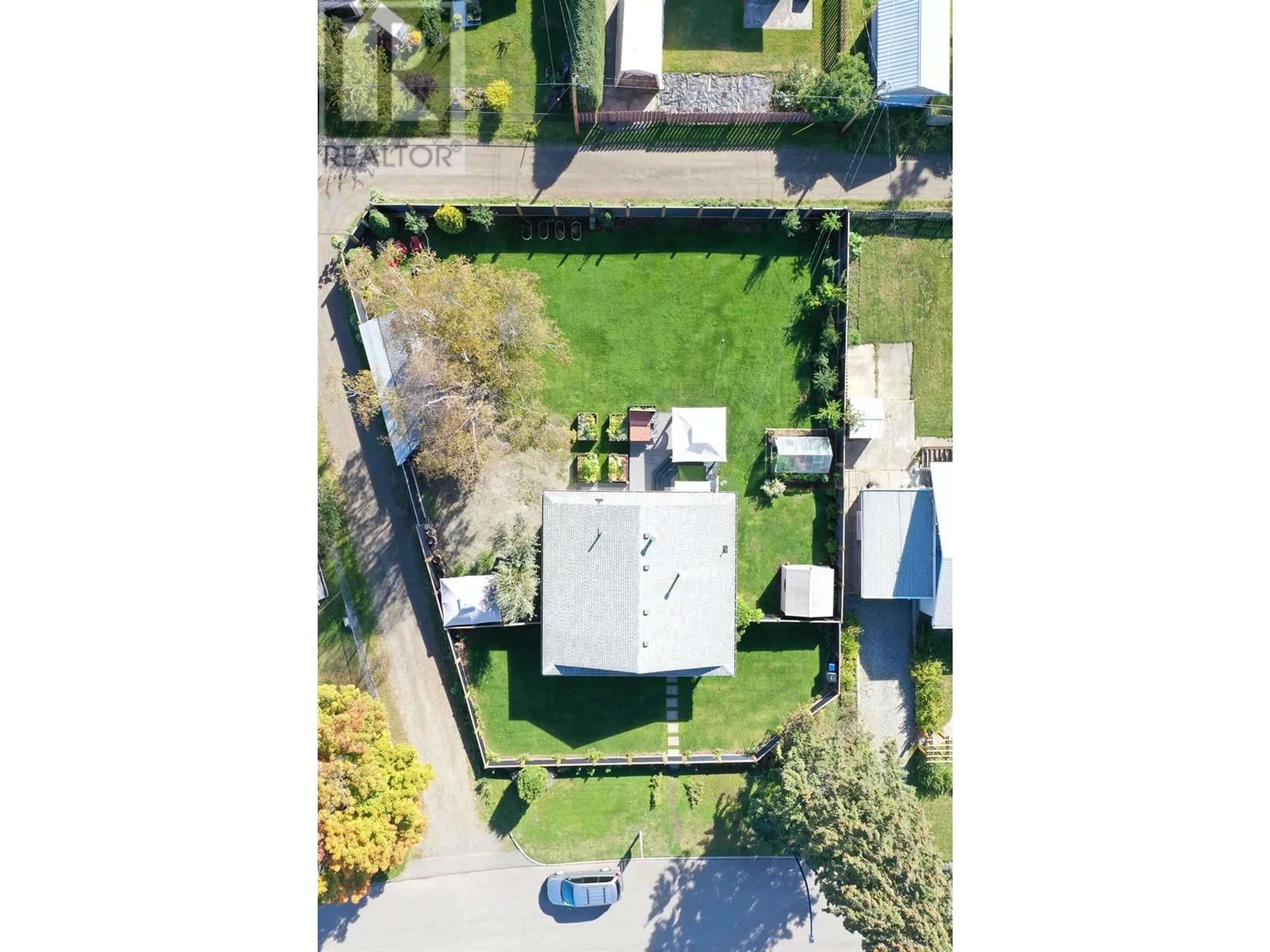 A pic from outside/outdoor area/front of a property/back of a property/a pic from drone, street for 1066 YORSTON AVENUE, Quesnel British Columbia V2J3B1