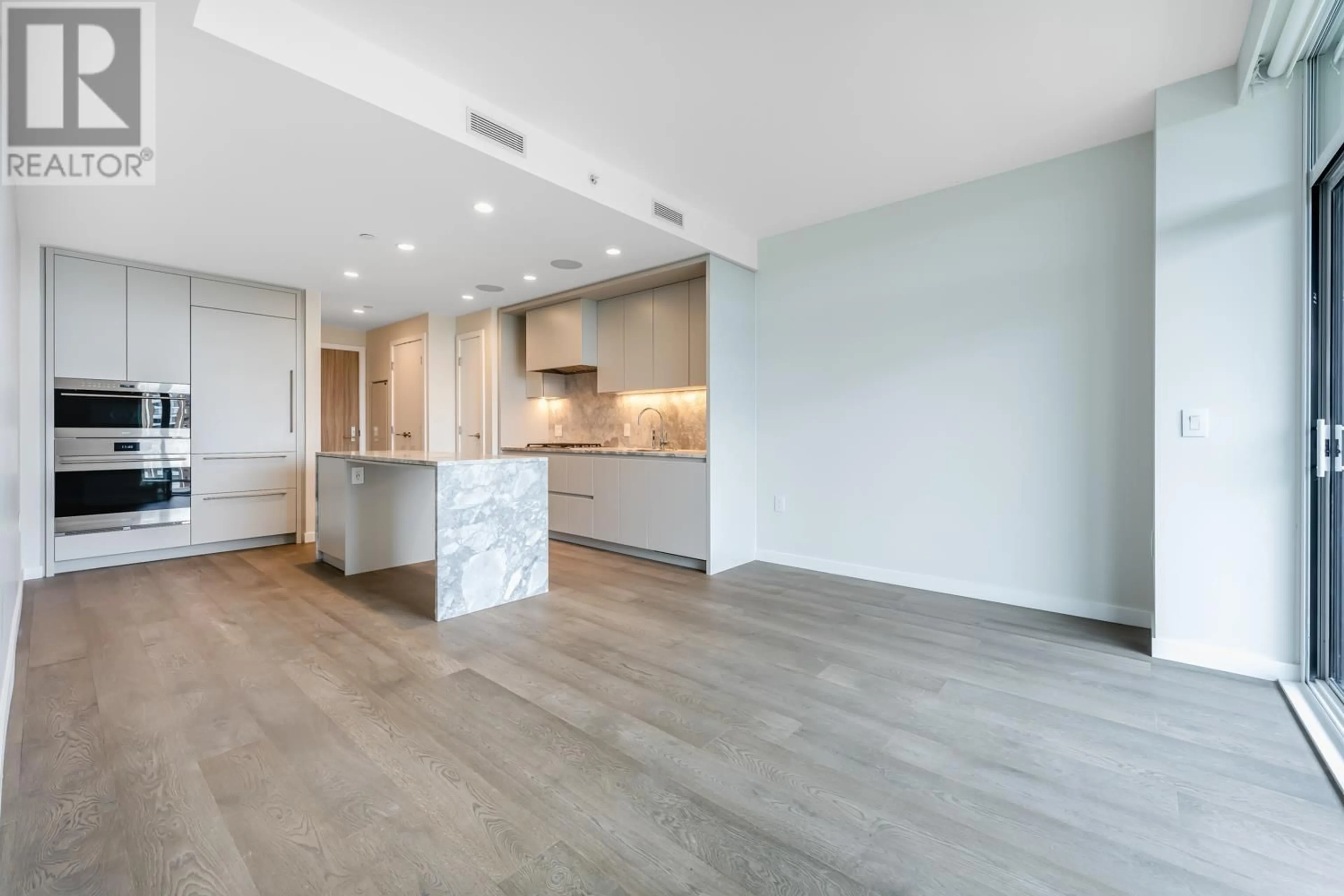 Open concept kitchen, unknown for 1302 7433 CAMBIE STREET, Vancouver British Columbia V6P0J8