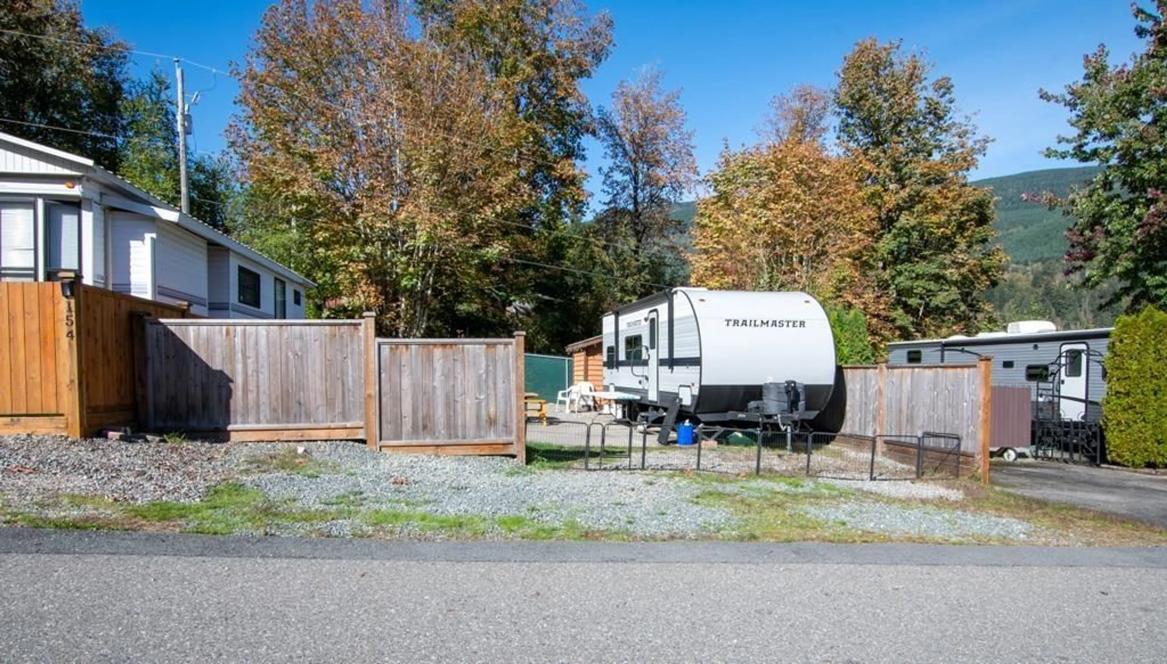 A pic from outside/outdoor area/front of a property/back of a property/a pic from drone, street for 155 - 1436 FROST ROAD, Chilliwack British Columbia V2R4X8