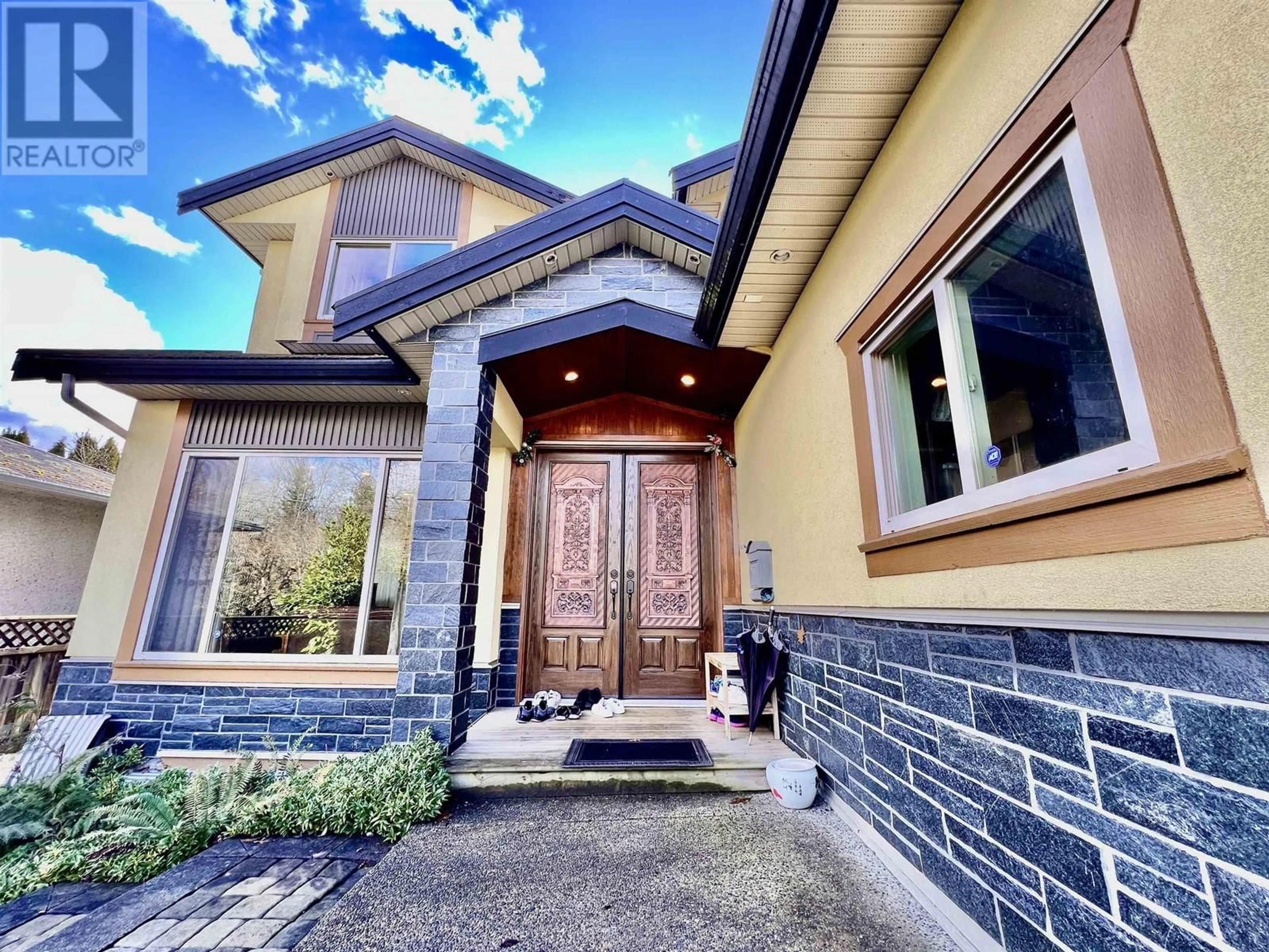 Home with brick exterior material, street for 7994 ELWELL STREET, Burnaby British Columbia V5E1M4