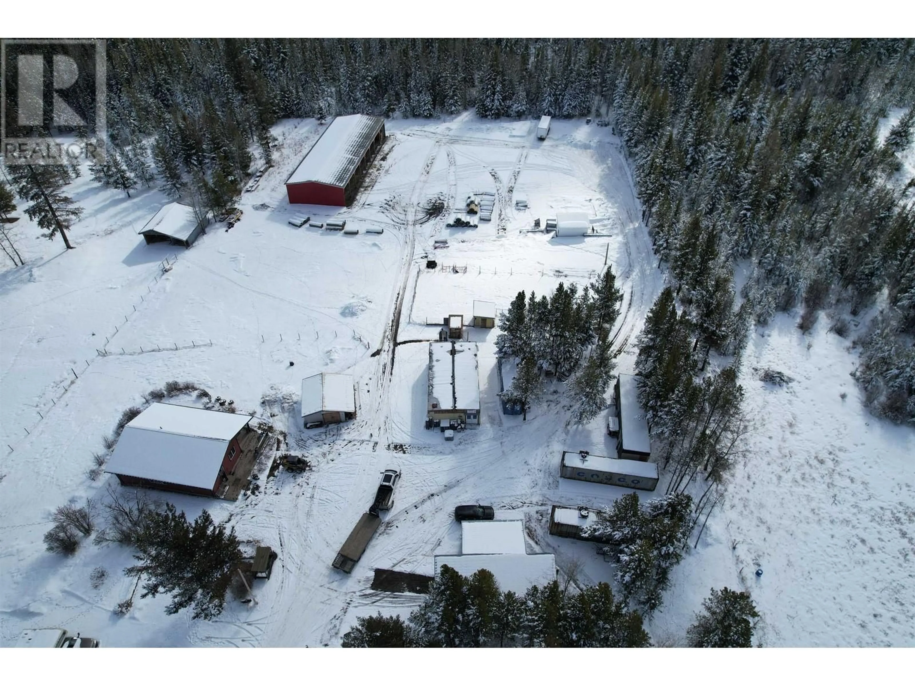 A pic from outside/outdoor area/front of a property/back of a property/a pic from drone, building for 6691 CARIBOO 97 HIGHWAY, 100 Mile House British Columbia V0K2E2