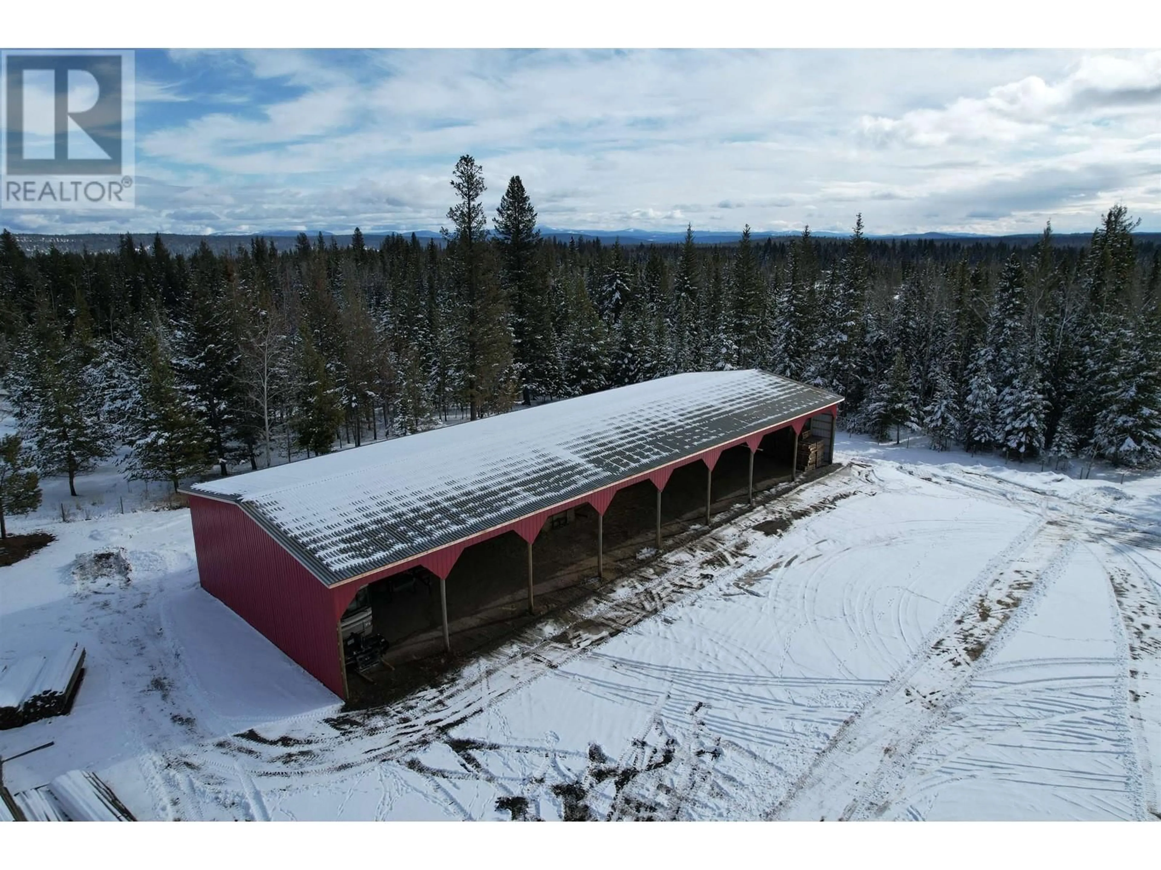 A pic from outside/outdoor area/front of a property/back of a property/a pic from drone, building for 6691 CARIBOO 97 HIGHWAY, 100 Mile House British Columbia V0K2E2