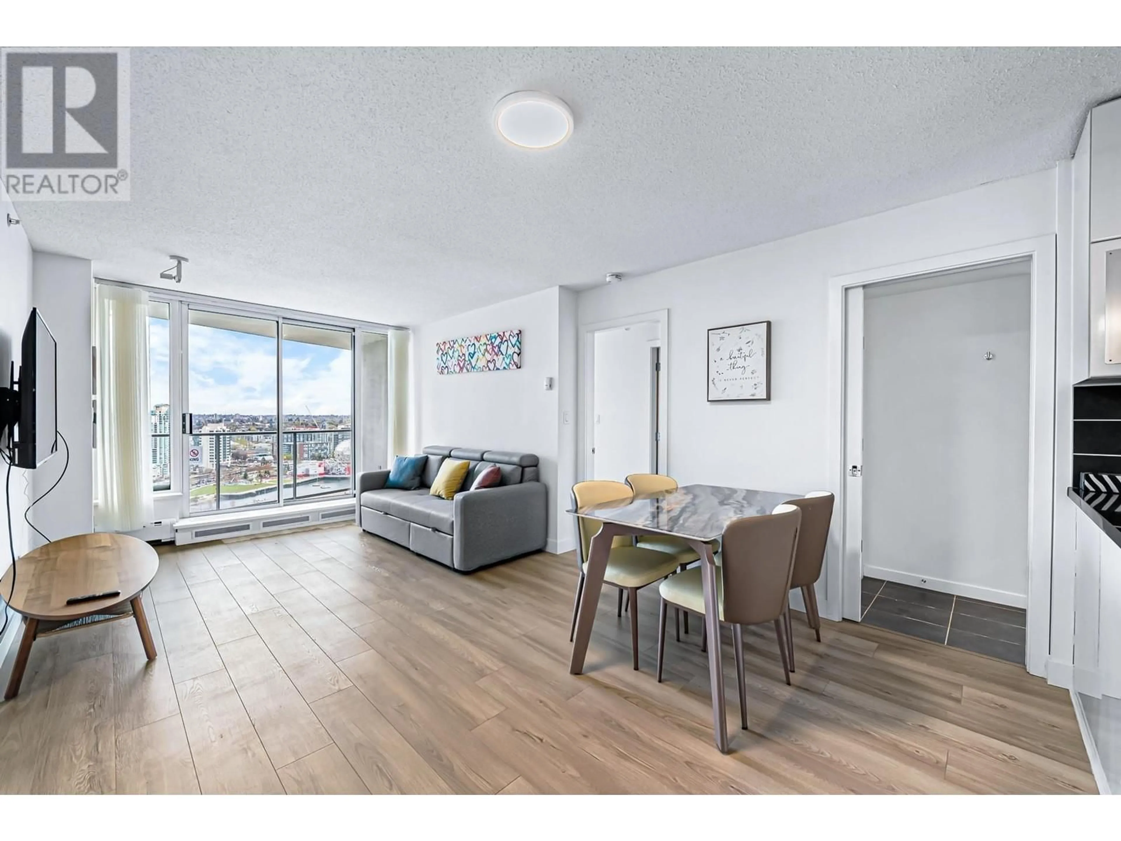 Living room with furniture, wood/laminate floor for 3103 689 ABBOTT STREET, Vancouver British Columbia V6B0J2