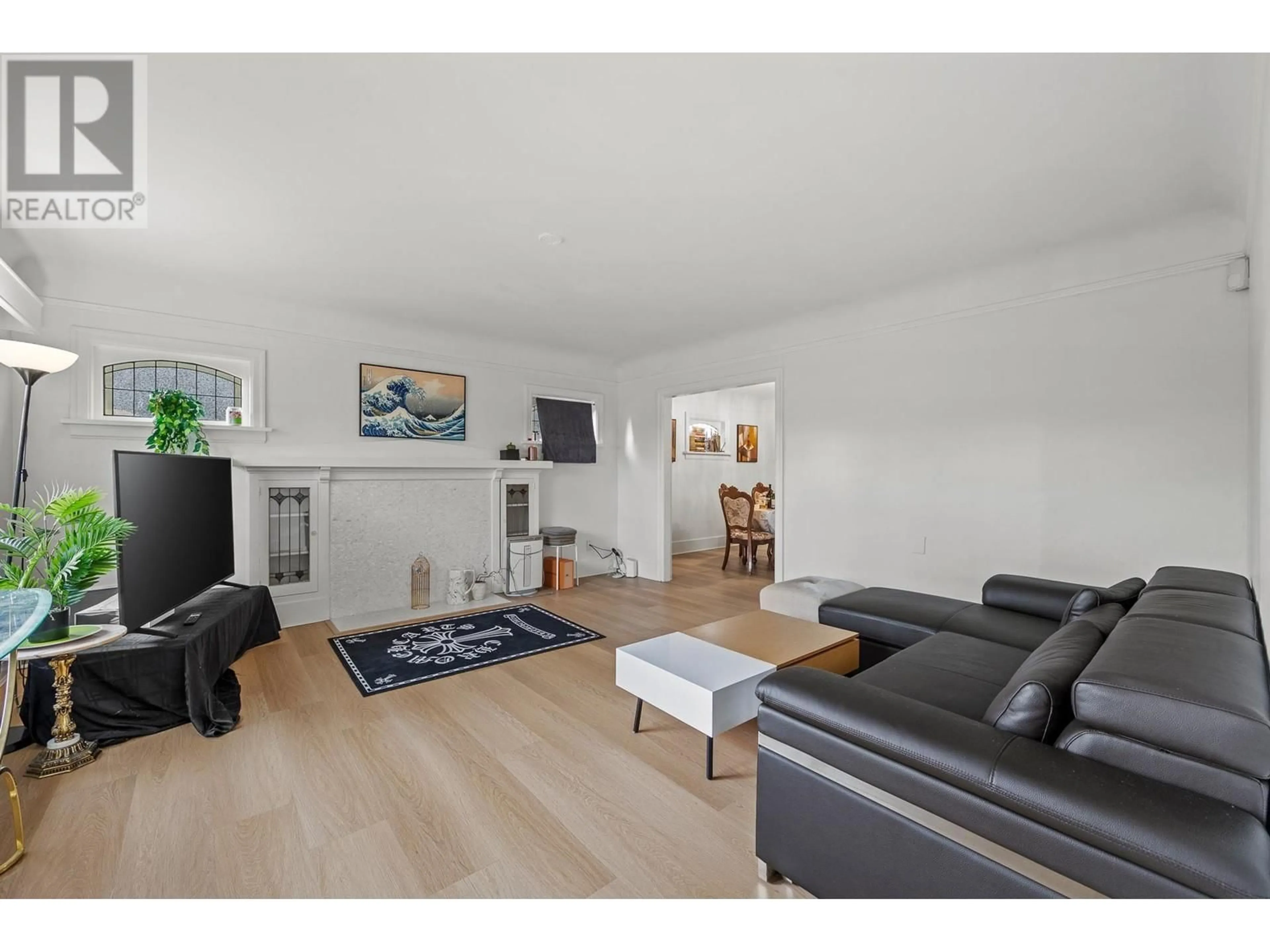 Living room with furniture, wood/laminate floor for 3719 W 3RD AVENUE, Vancouver British Columbia V6R1M2