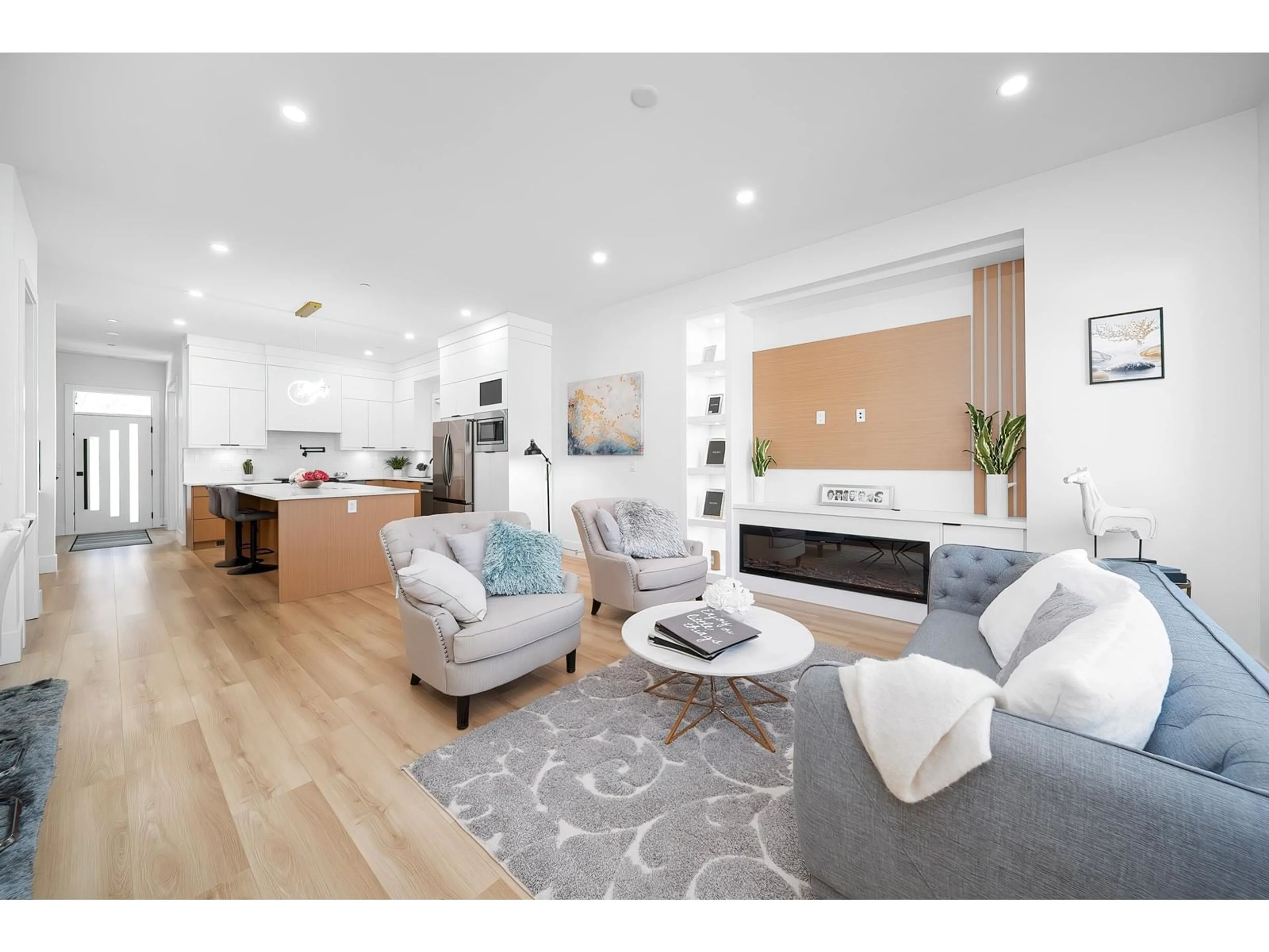 Open concept kitchen, wood/laminate floor for 7743 197, Langley British Columbia V2Y3V5