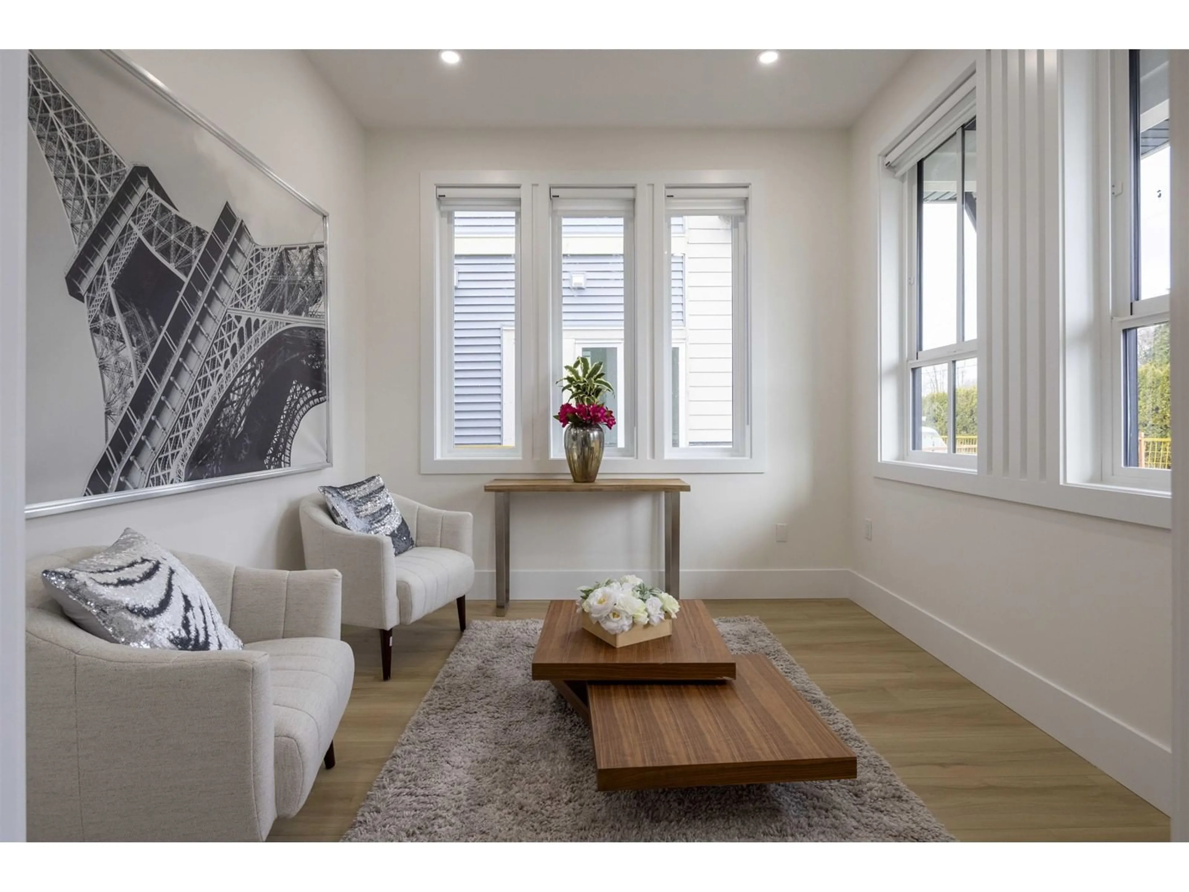 Living room with furniture, wood/laminate floor for 7759 197, Langley British Columbia V2Y3V5